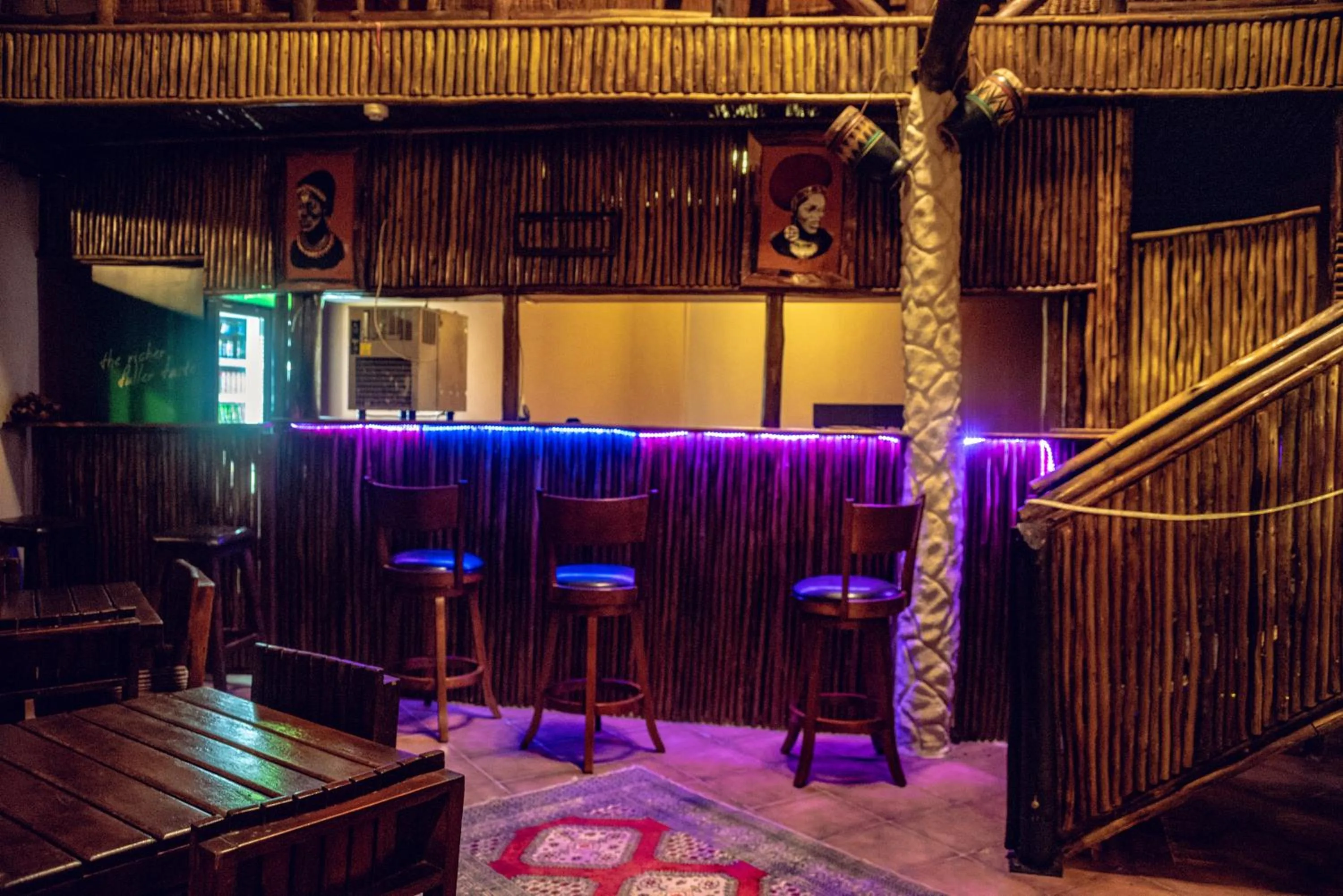 Lounge or bar in African Home Hotel