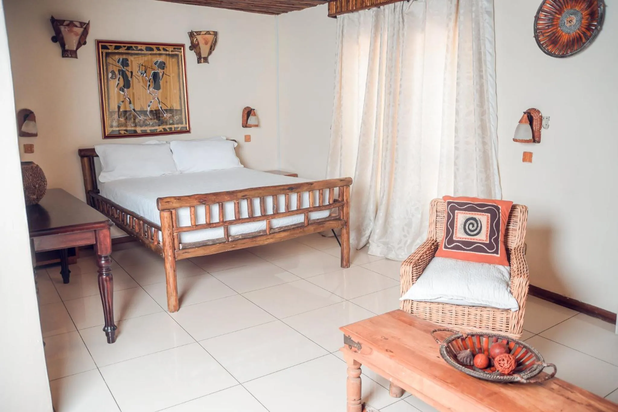 Bed in African Home Hotel