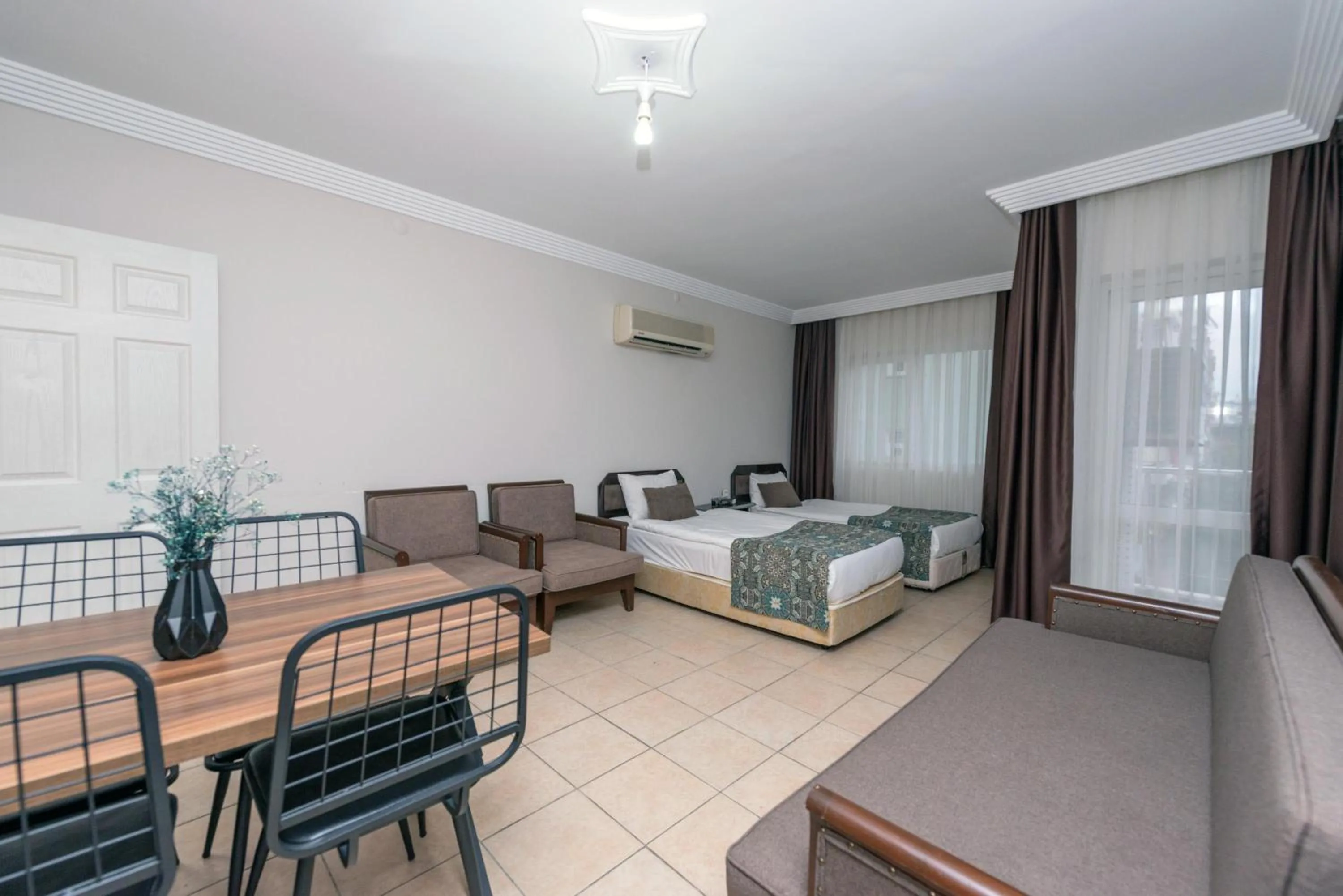 Bed in City Inn Family Apart