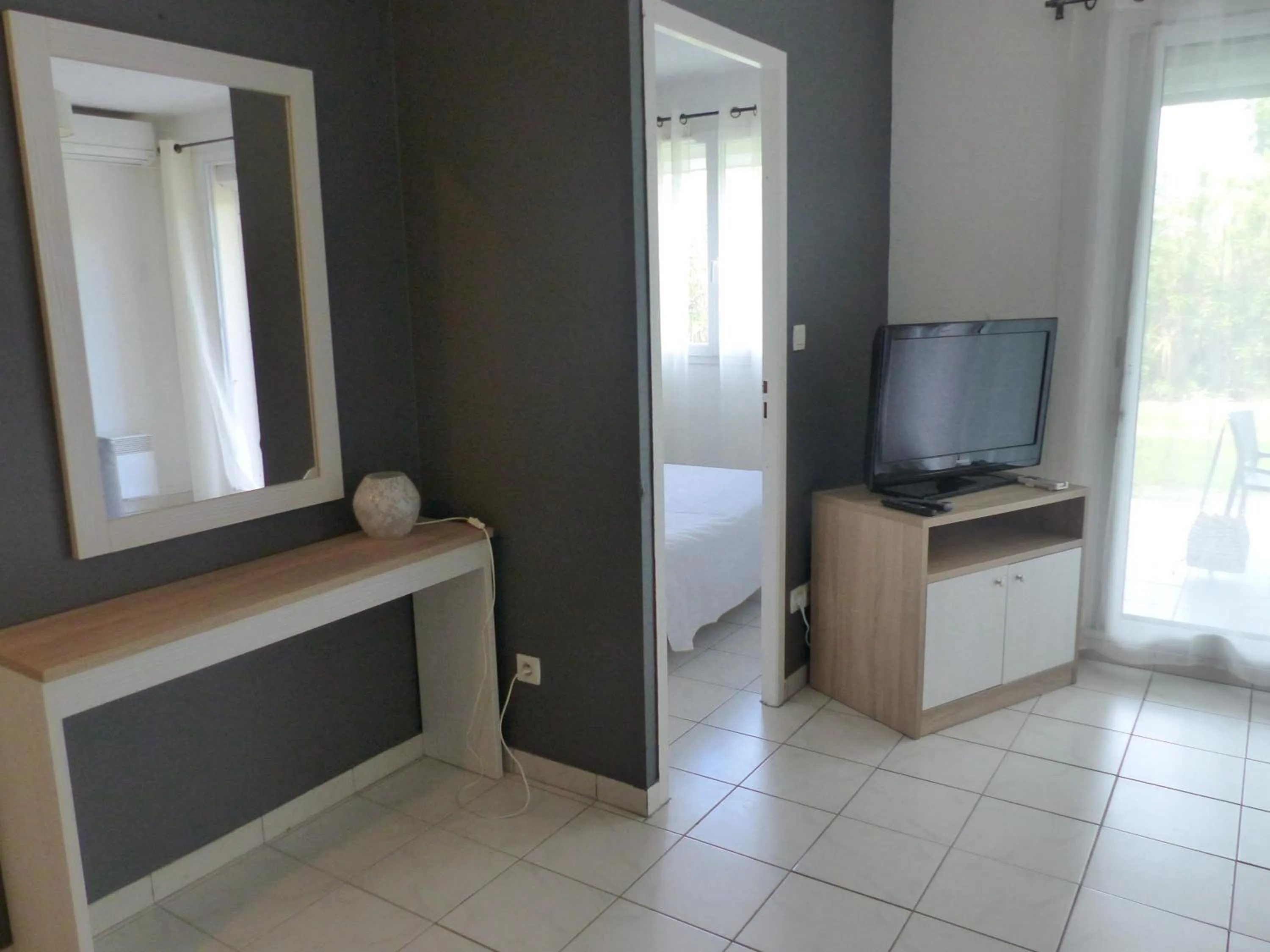 Living room in Le Jardin de Babylone Résidence Festive & Naturiste "réservé aux couples uniquement"