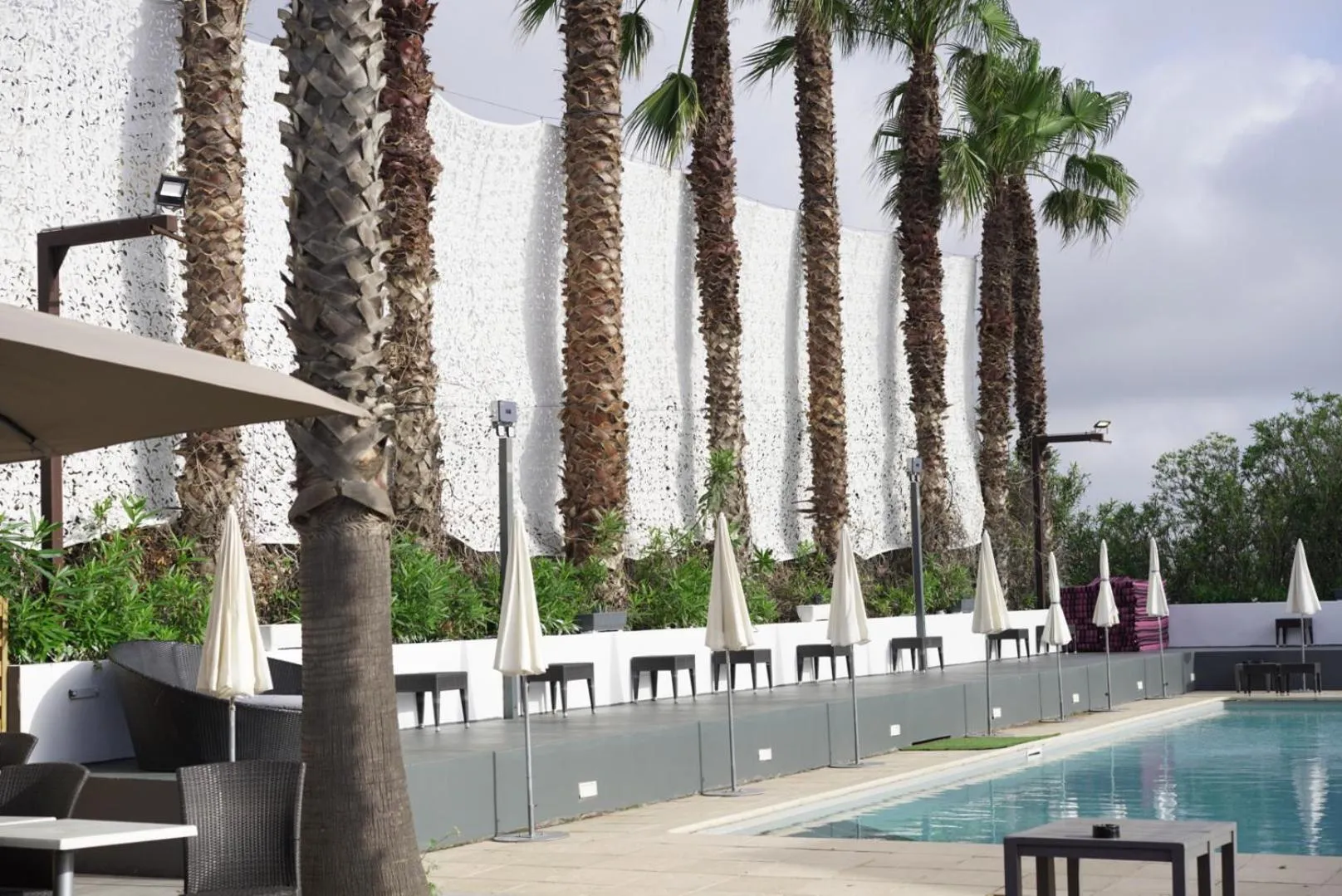 Swimming pool in Le Jardin de Babylone Résidence Festive & Naturiste "réservé aux couples uniquement"