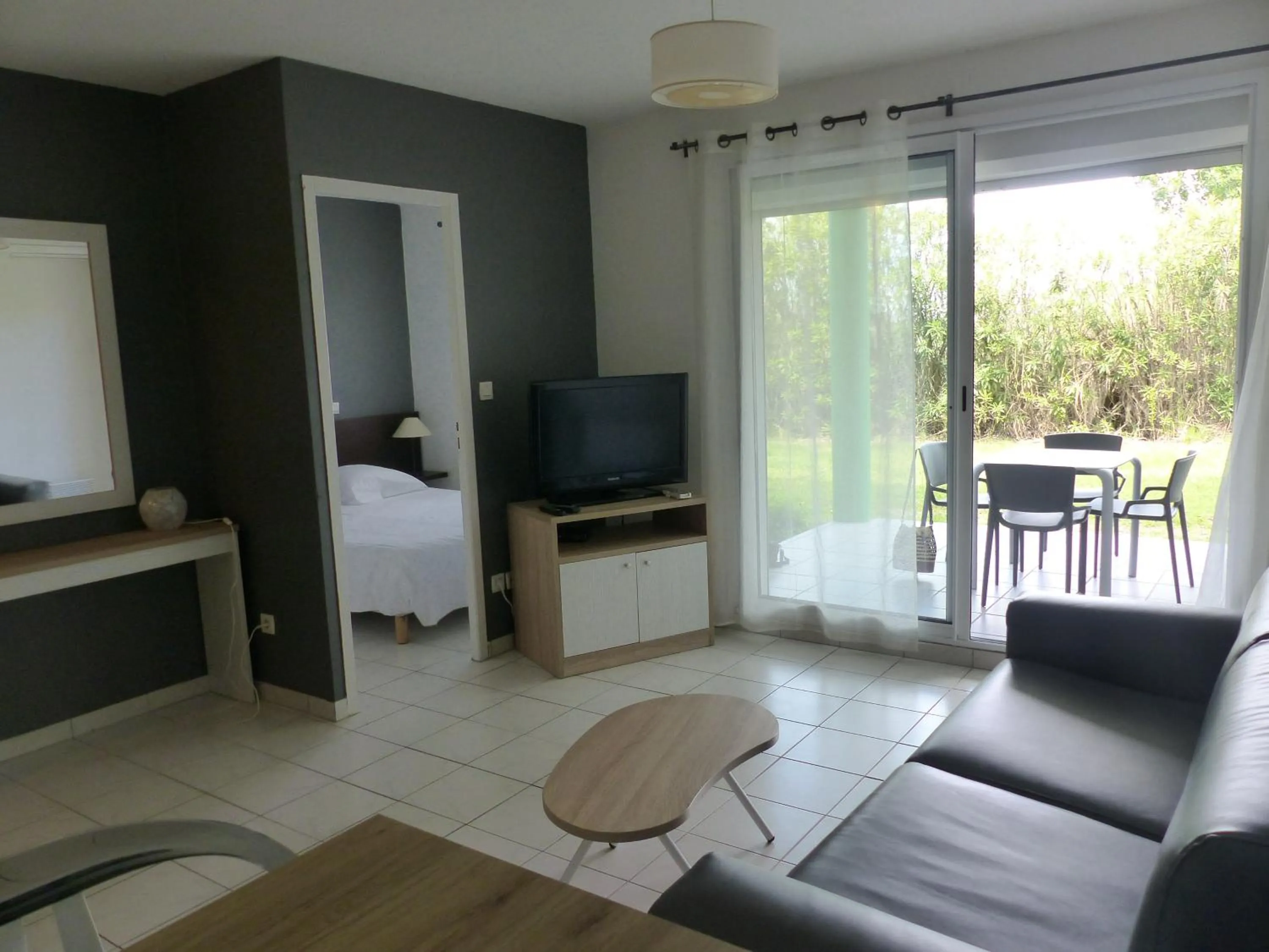 Living room in Le Jardin de Babylone Résidence Festive & Naturiste "réservé aux couples uniquement"