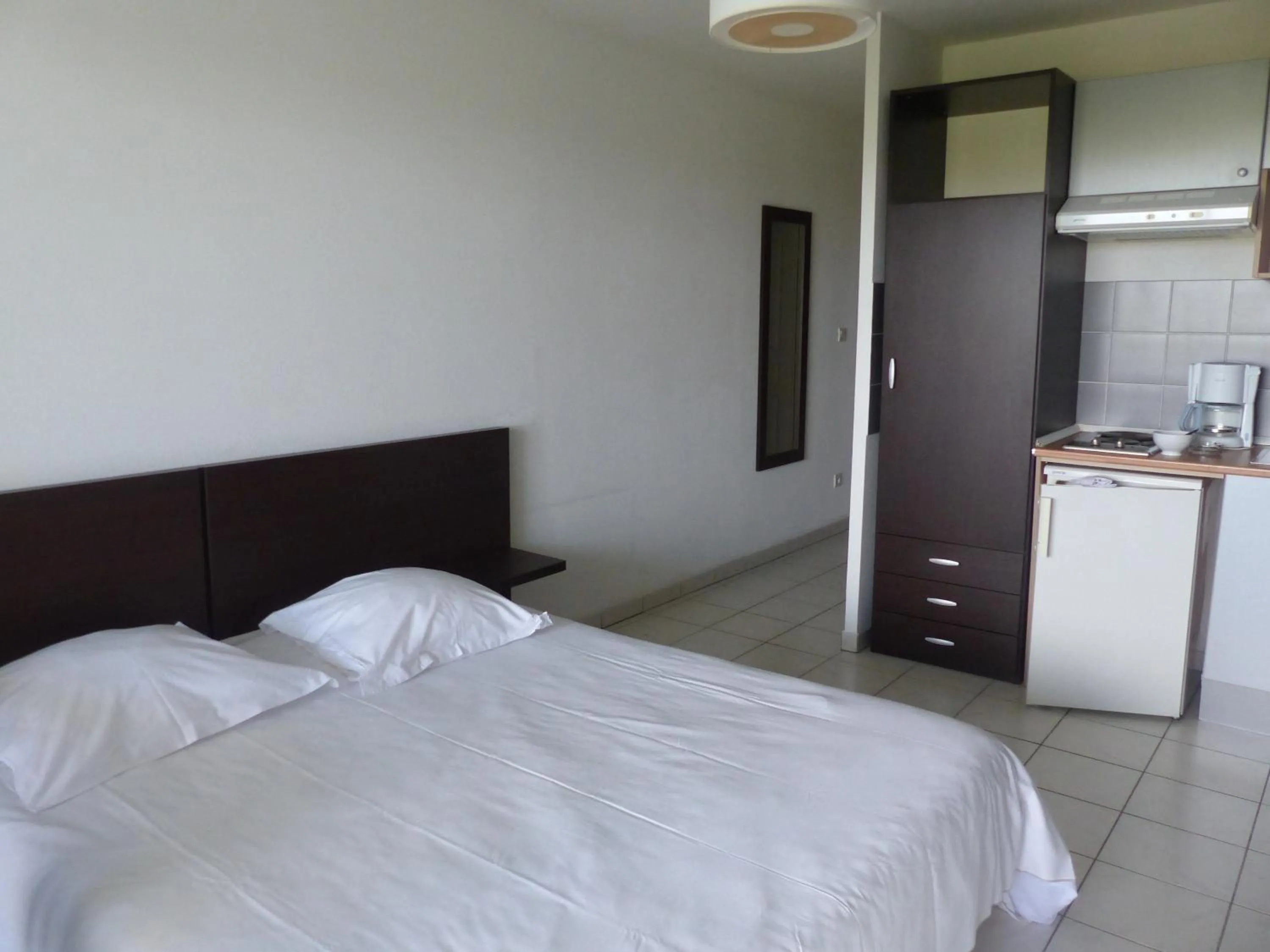 Bed in Le Jardin de Babylone Résidence Festive & Naturiste "réservé aux couples uniquement"