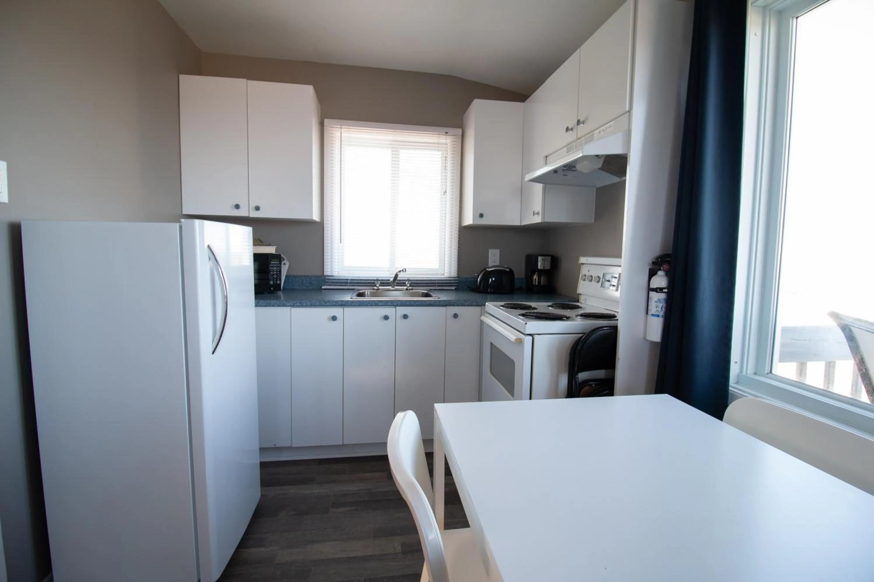 Kitchen or kitchenette in Motel de la mer