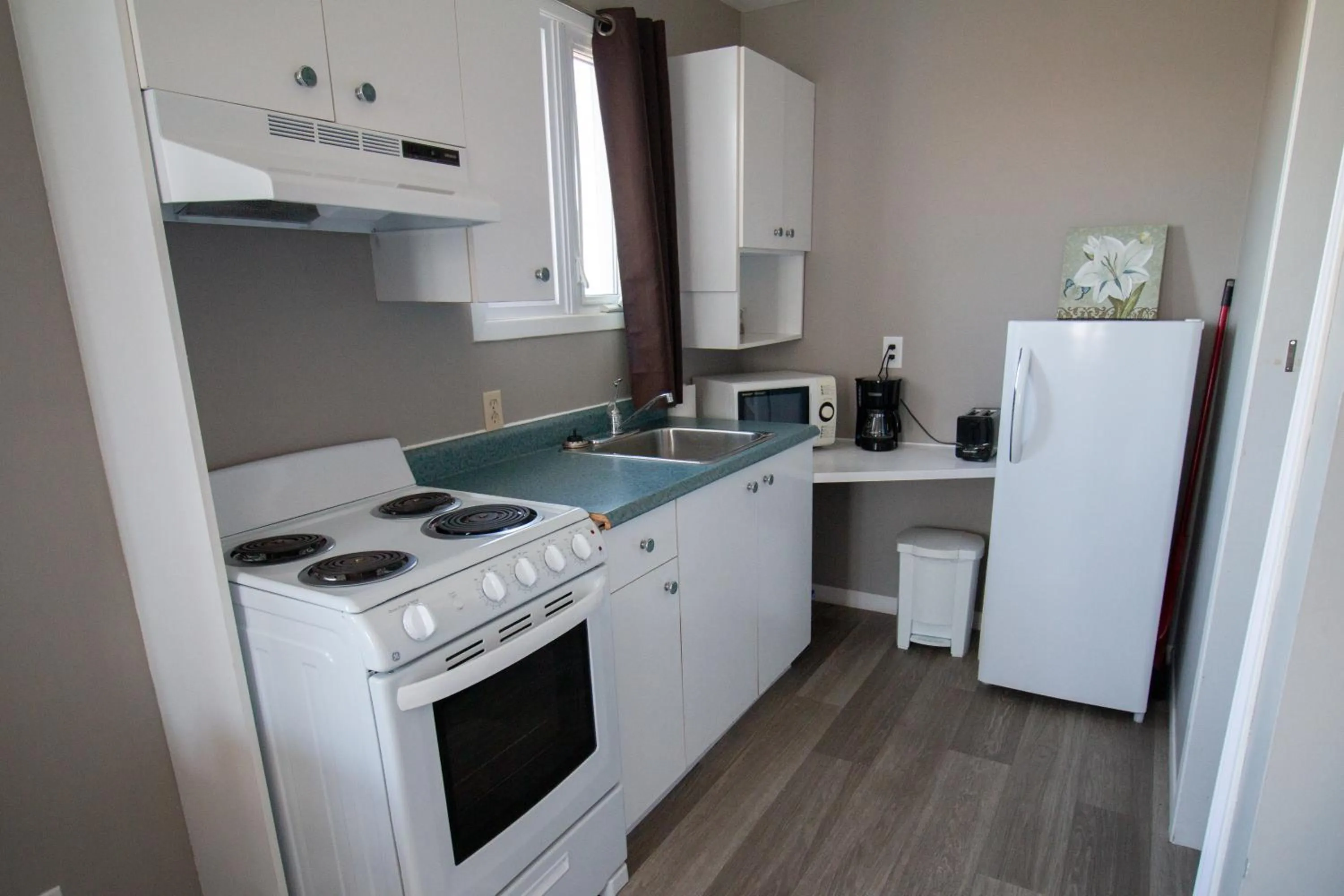 Kitchen or kitchenette in Motel de la mer