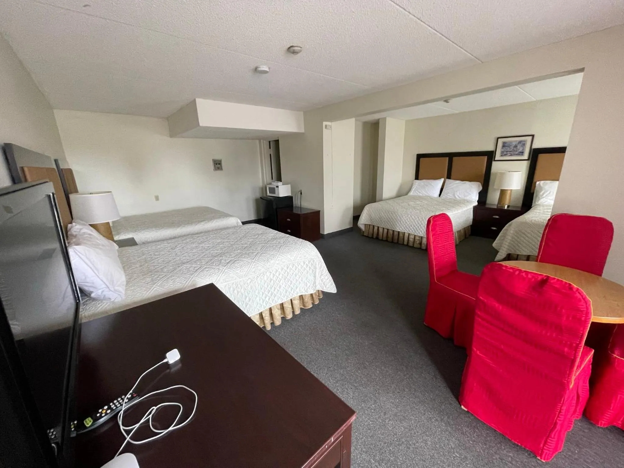 Bed in Heritage Inn & Suites