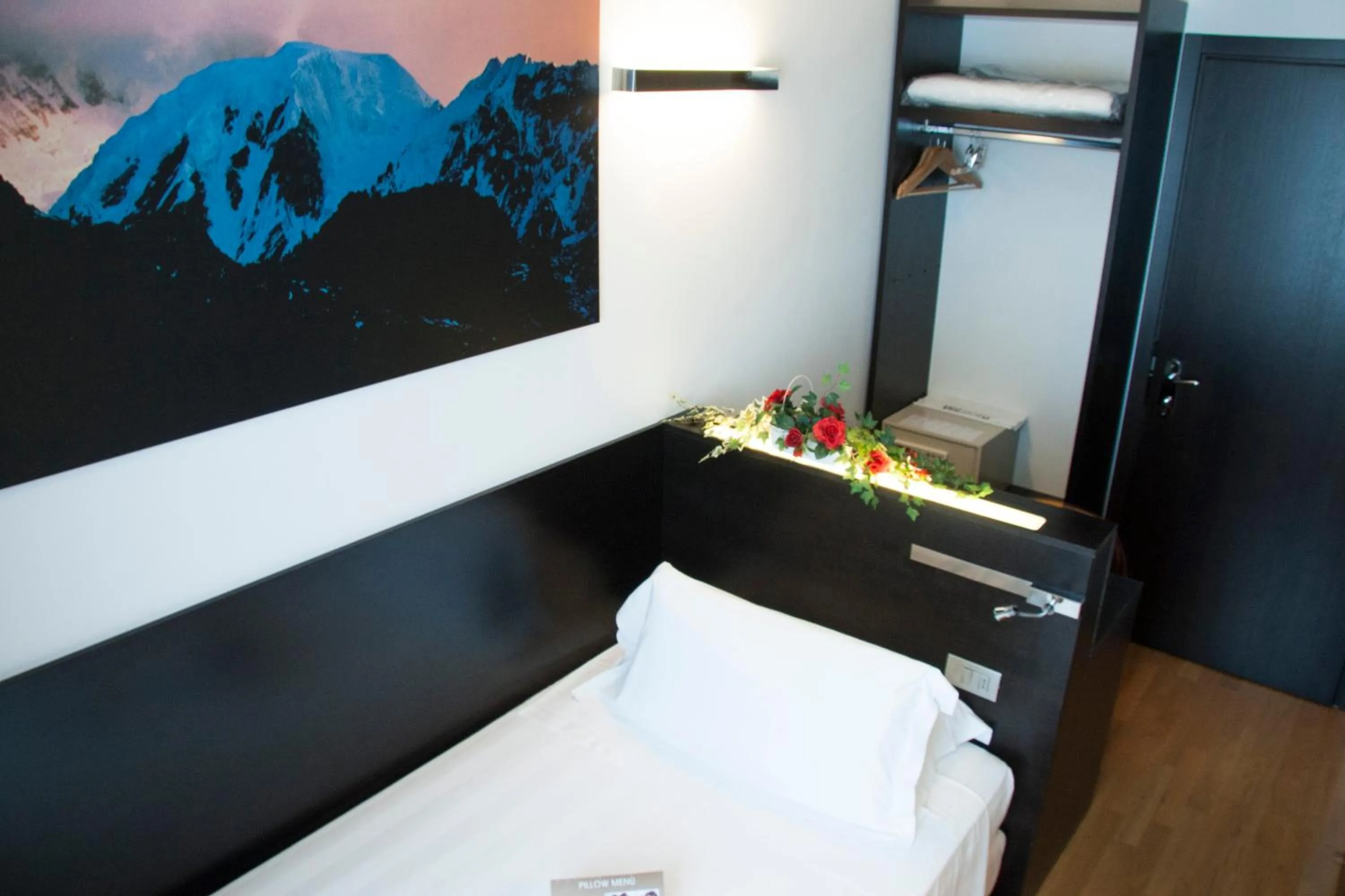 Bed in Card International Hotel