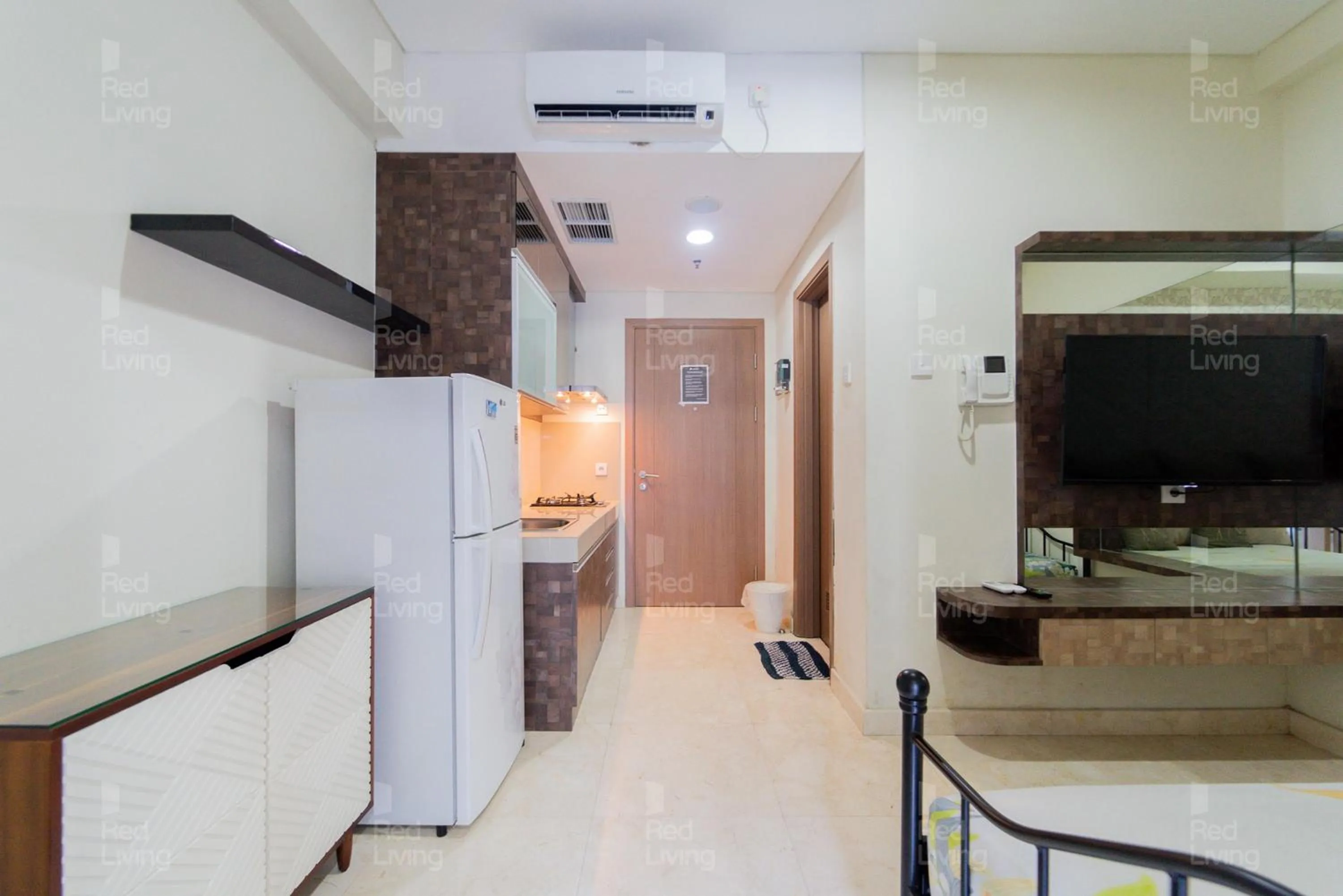 Kitchen or kitchenette in RedLiving Apartemen Puri Orchard - Tower Magnolia
