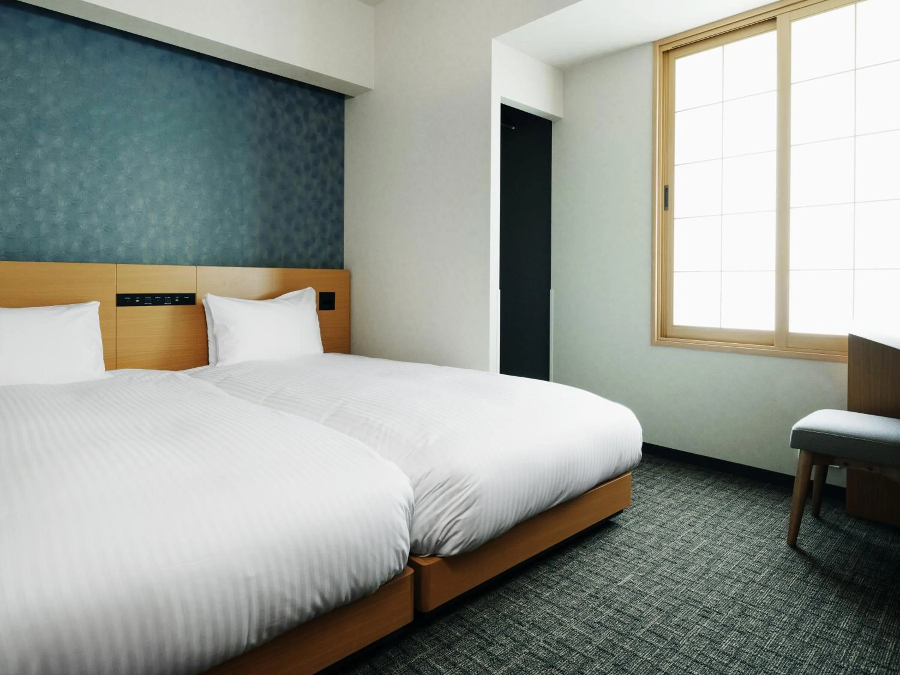 Photo of the whole room, Bed in MIMARU Tokyo Station East