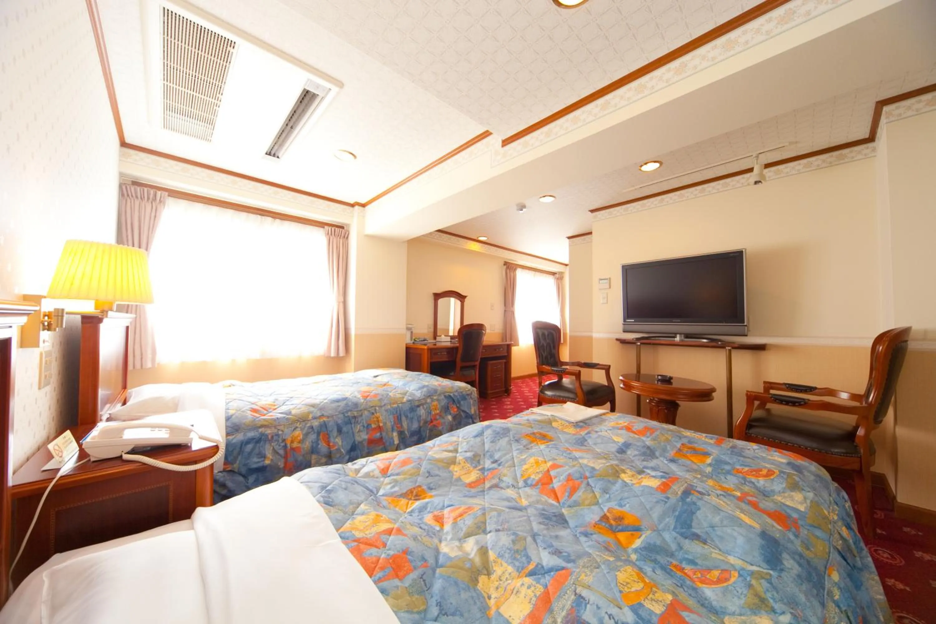 Photo of the whole room, Bed in Beppu Station Hotel