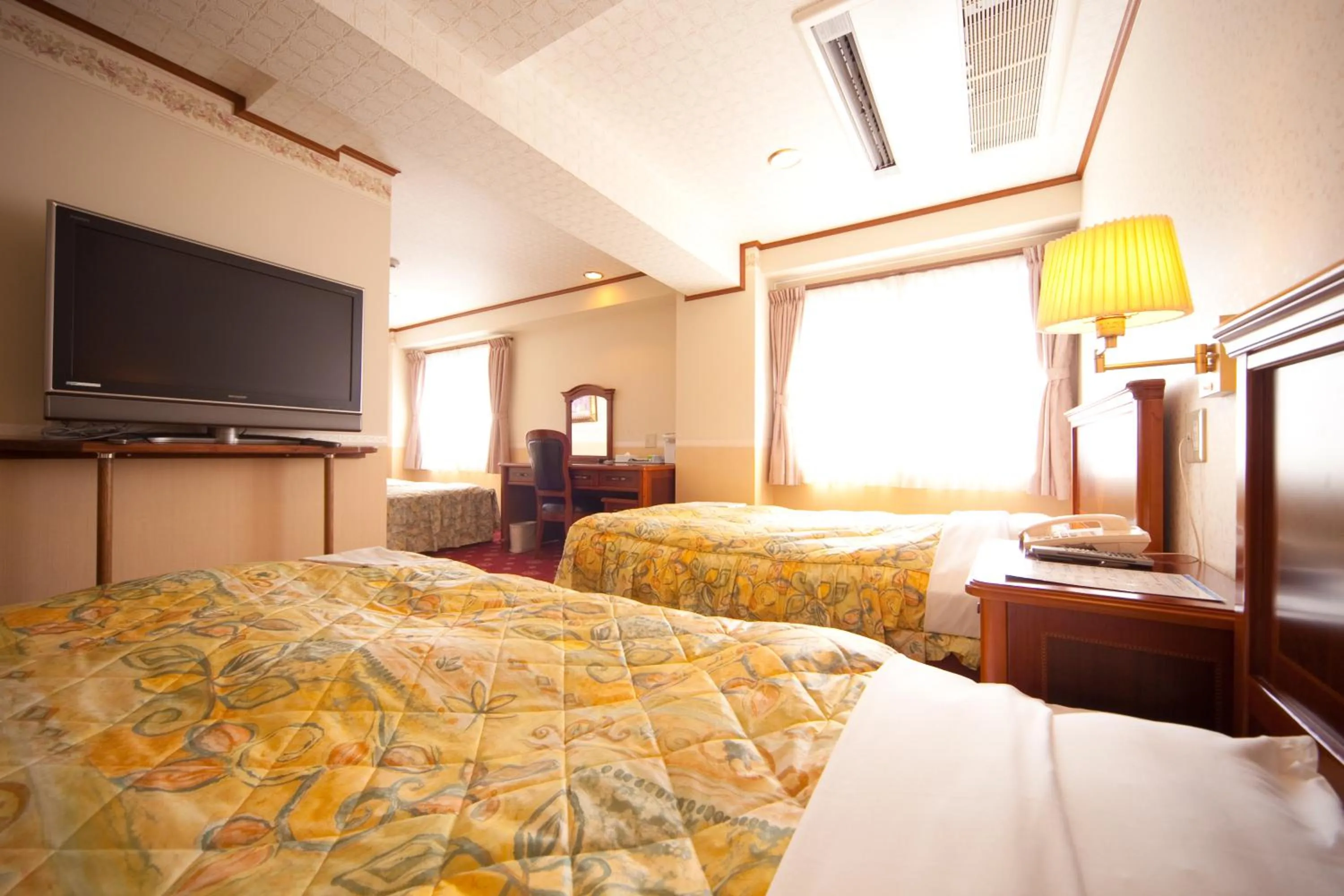 Photo of the whole room, Bed in Beppu Station Hotel