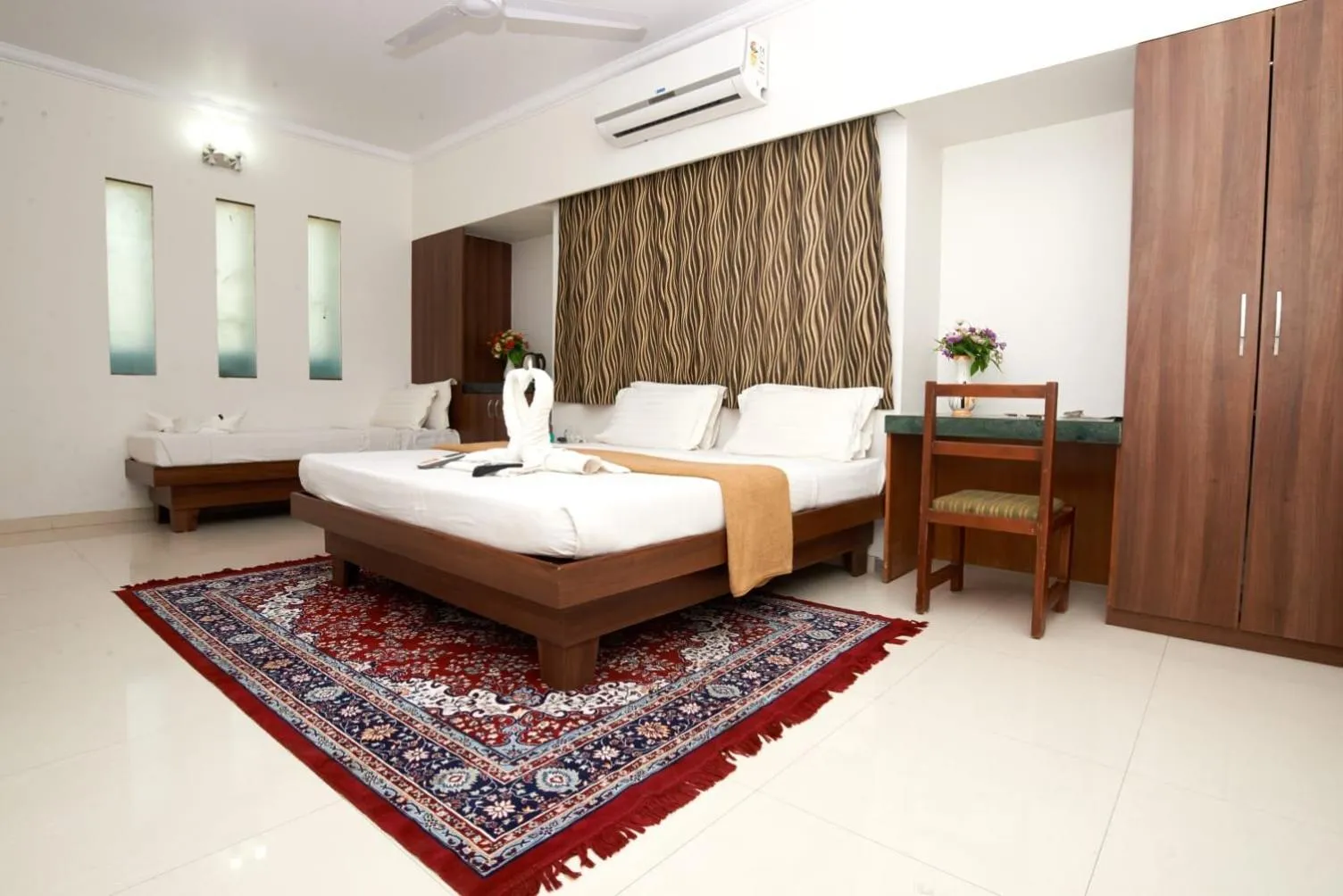 Bed in Hotel Sai Sangam