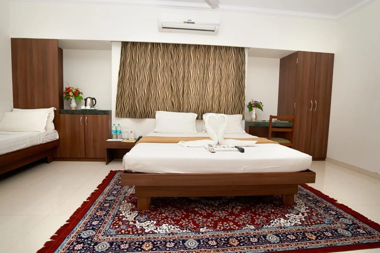 Bed in Hotel Sai Sangam