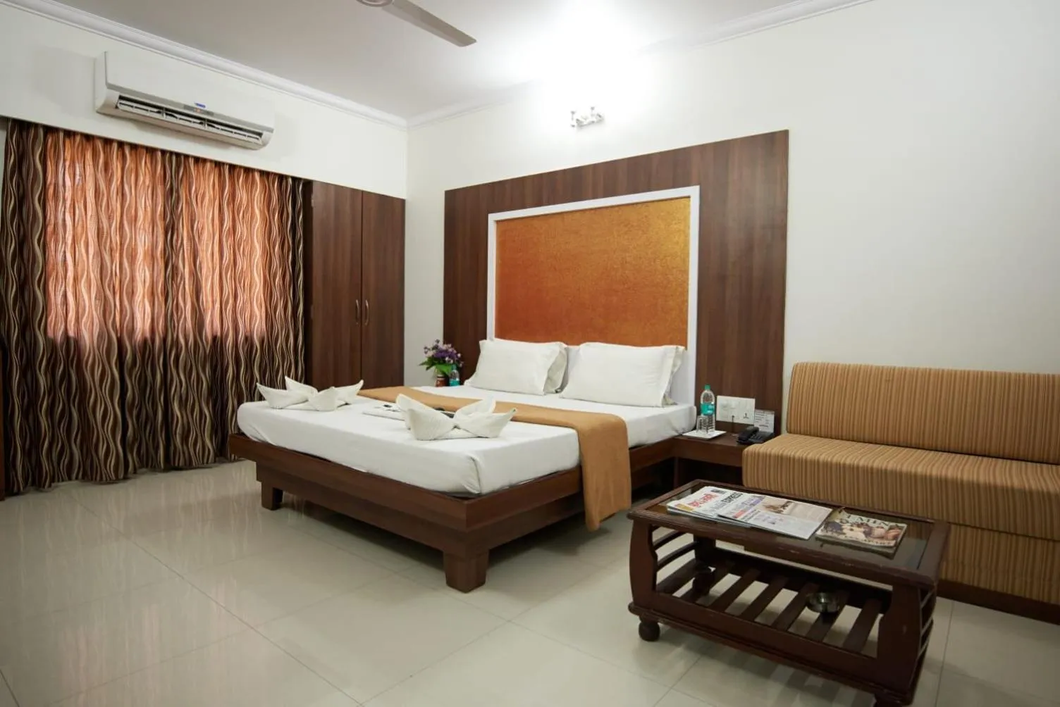 Bed in Hotel Sai Sangam