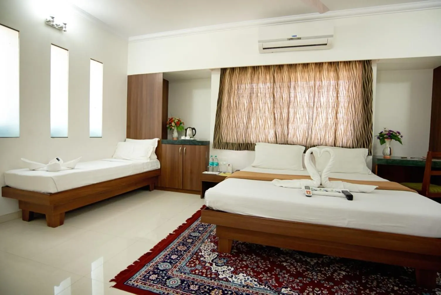 Bed in Hotel Sai Sangam