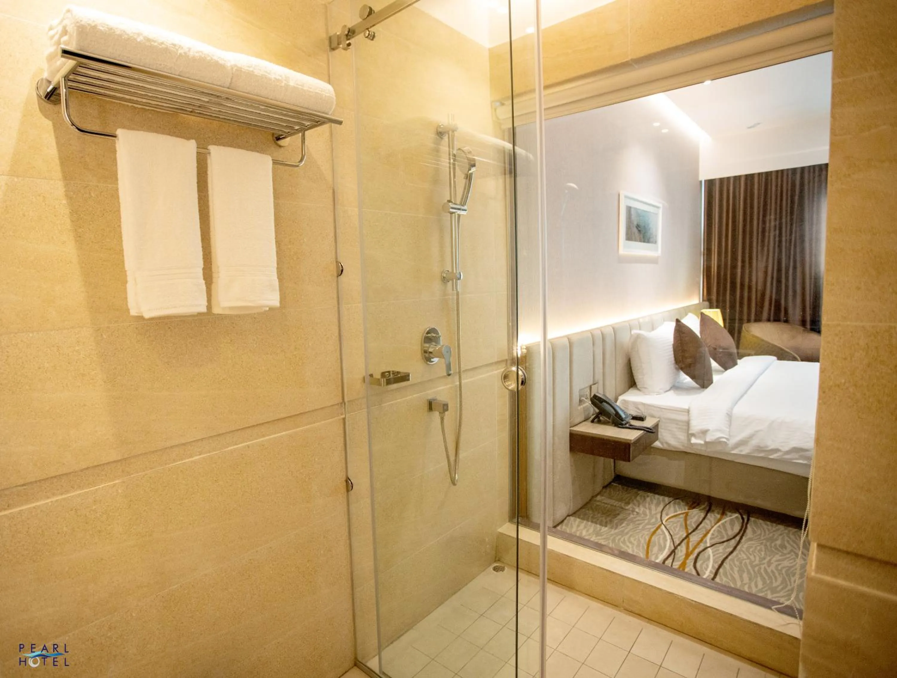 Shower, Bed in Pearl Hotel