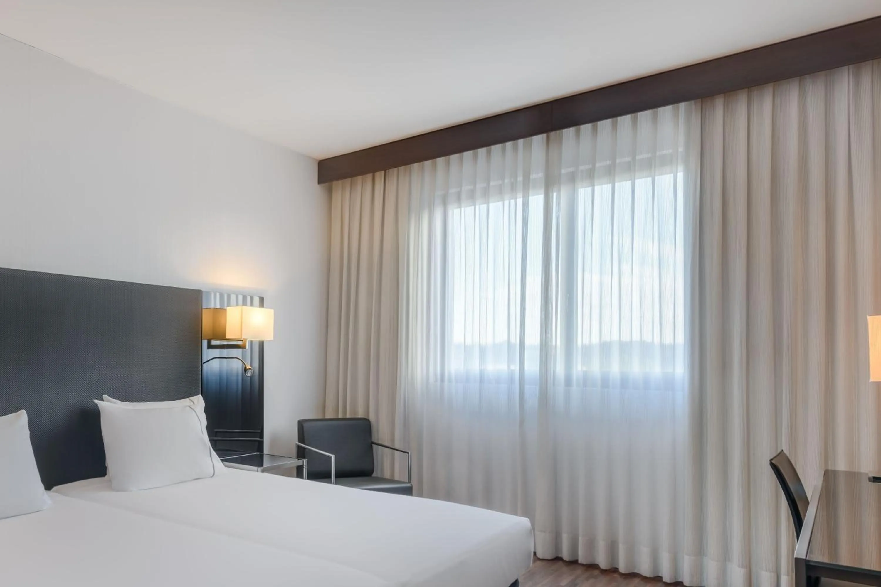 Photo of the whole room, Bed in AC Hotel Vicenza by Marriott