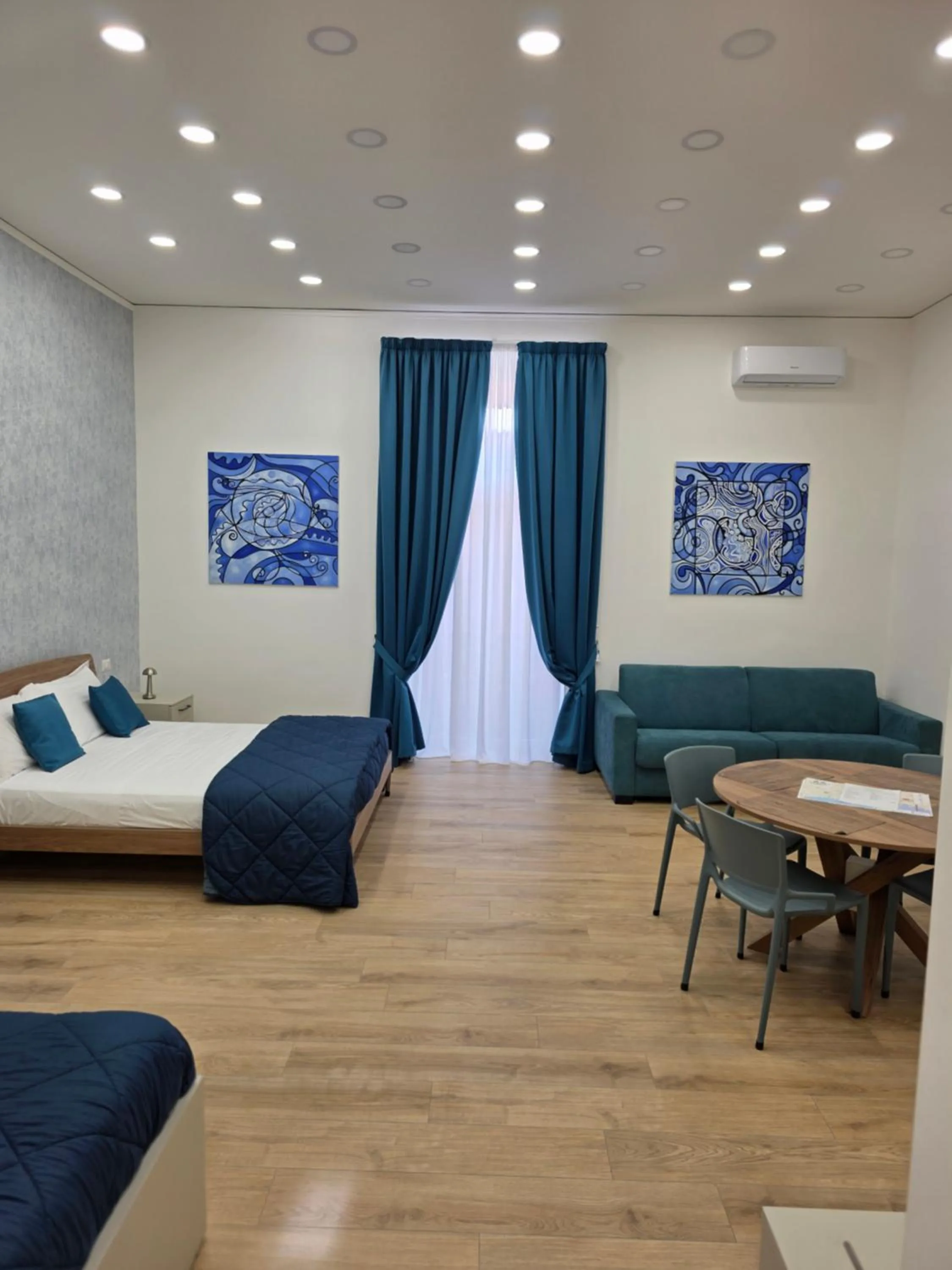 Bed in Toto e Peppino Luxury Rooms