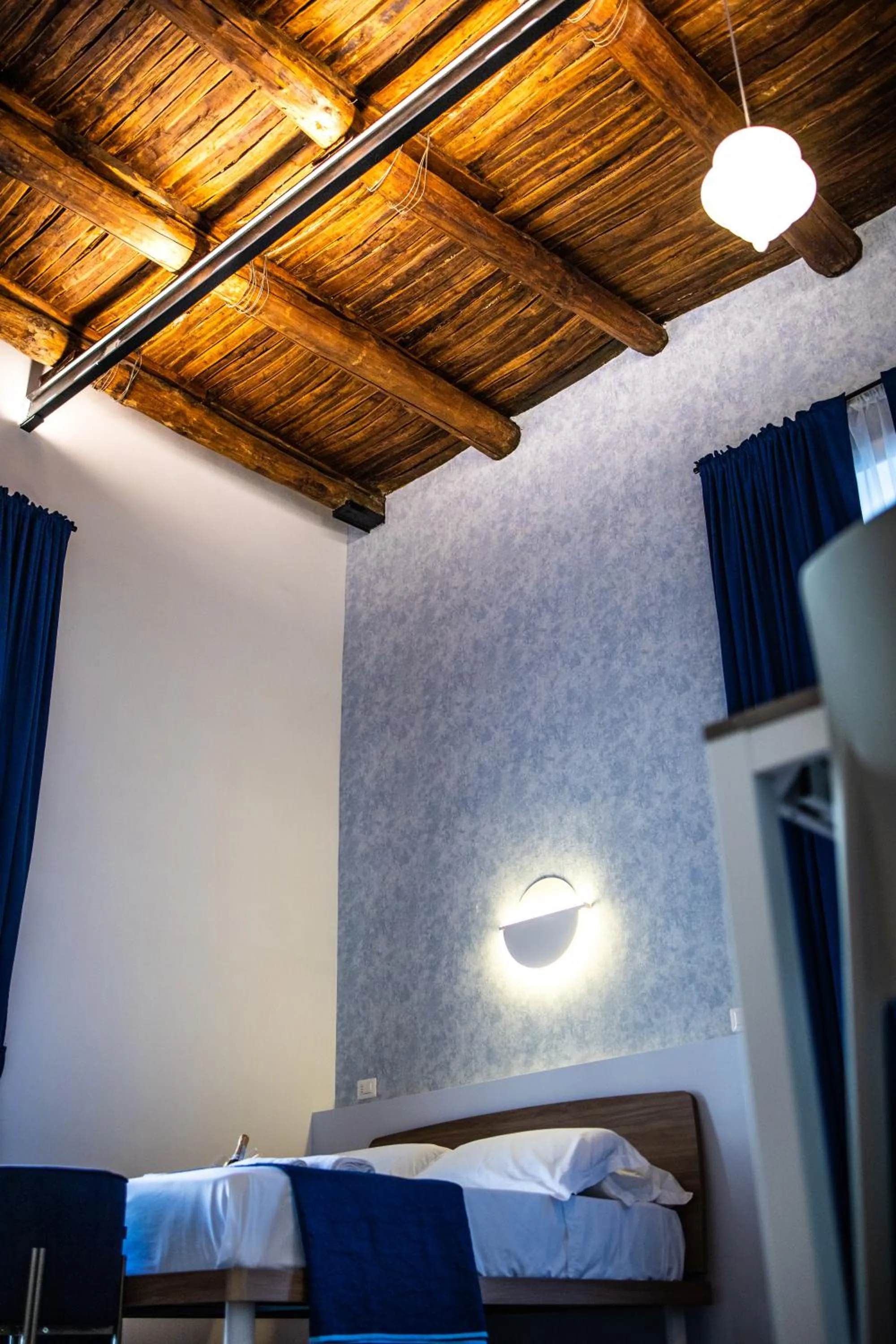 Bed in Toto e Peppino Luxury Rooms