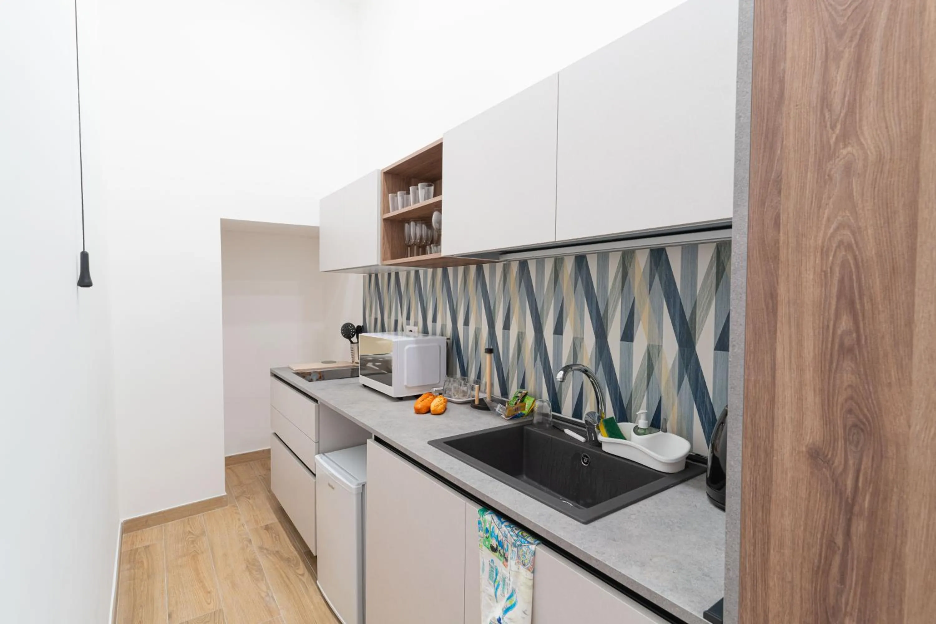 Kitchen or kitchenette in Toto e Peppino Luxury Rooms