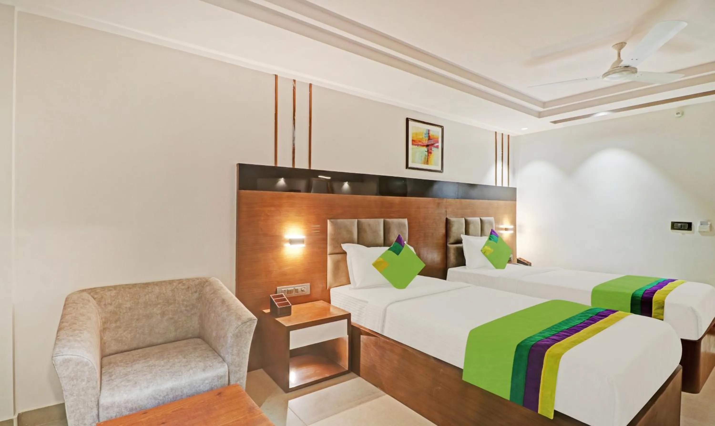 Photo of the whole room, Bed in Treebo Emora Grand