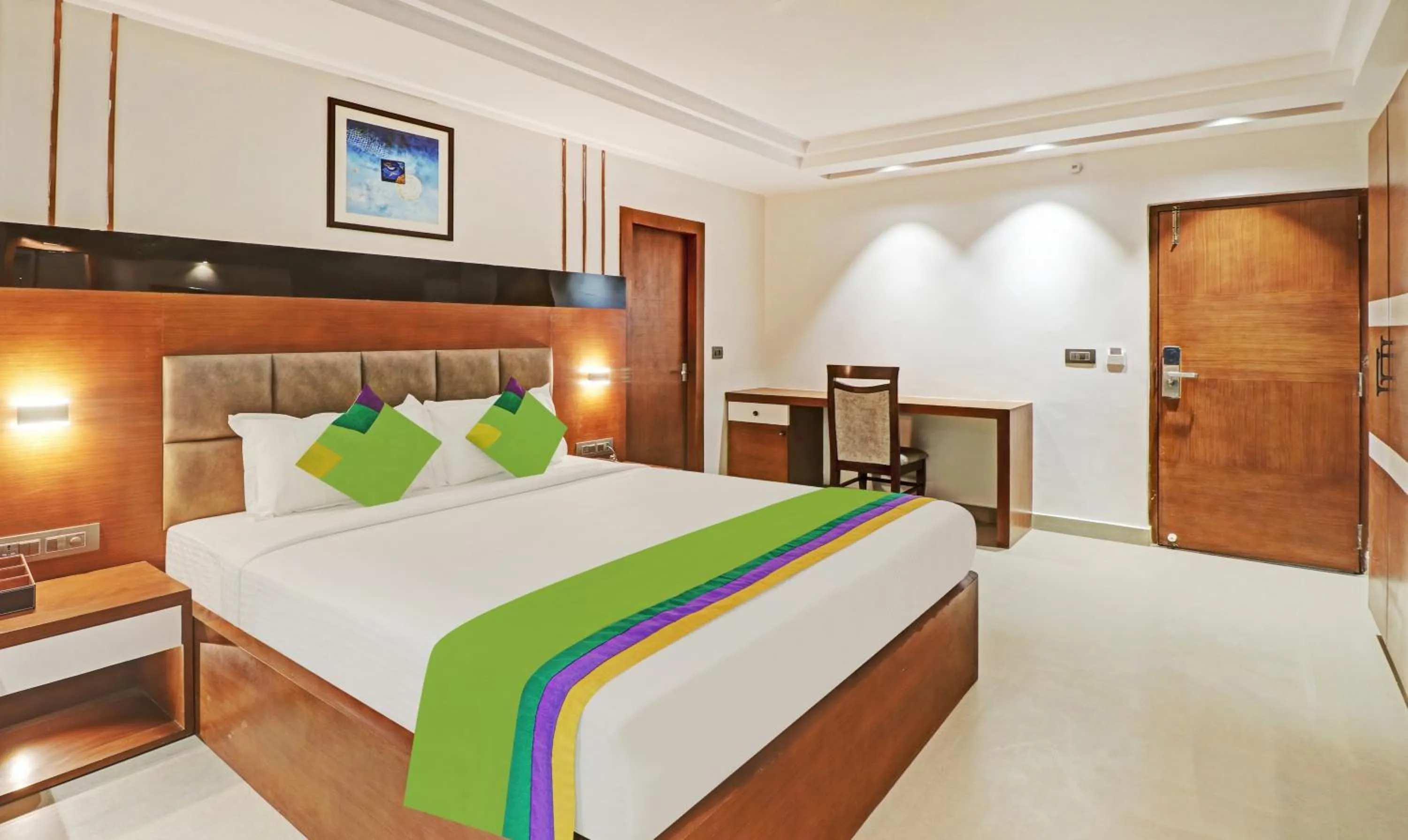 Photo of the whole room, Bed in Treebo Emora Grand