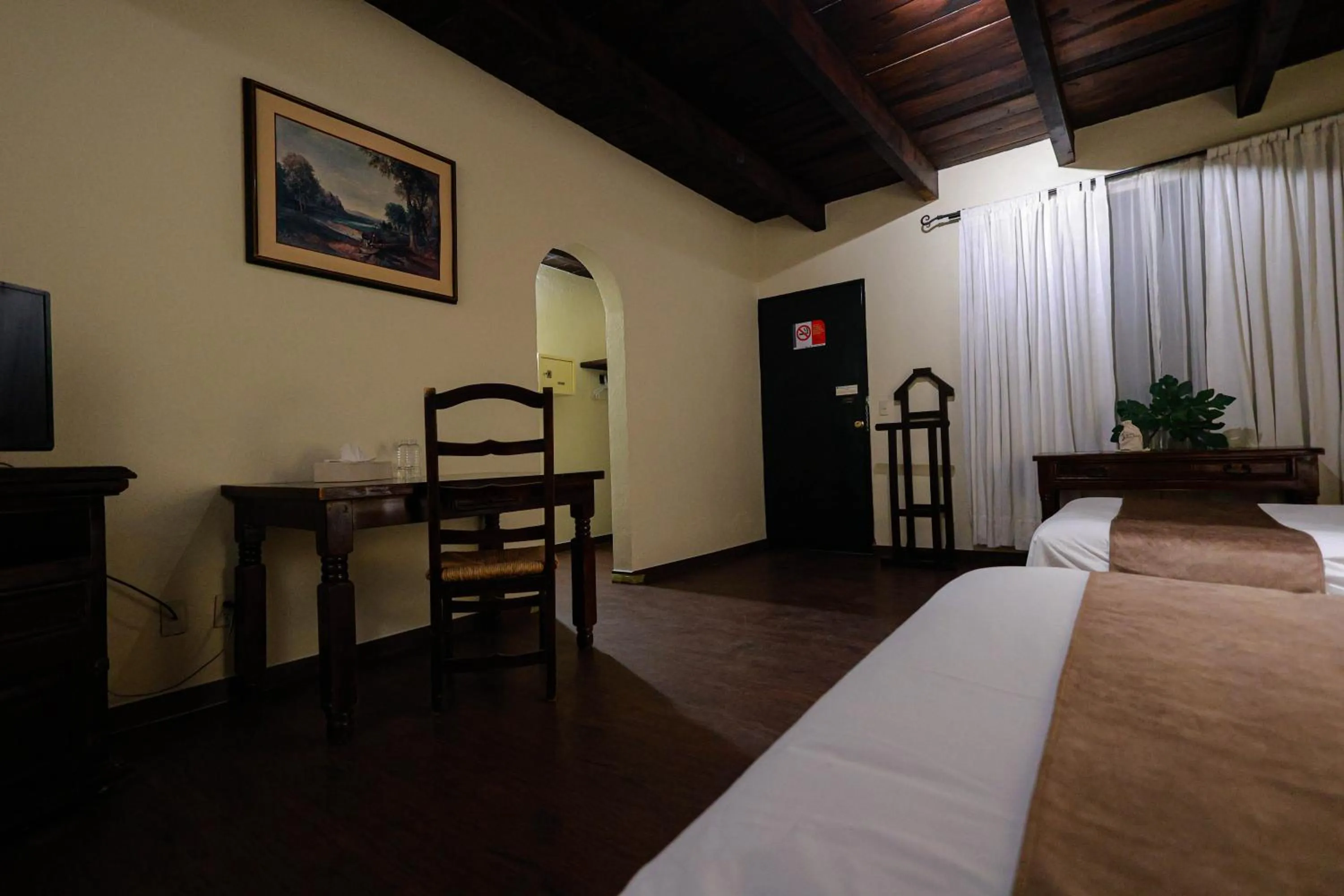 Bed in Hotel Hacienda San Miguel Regla