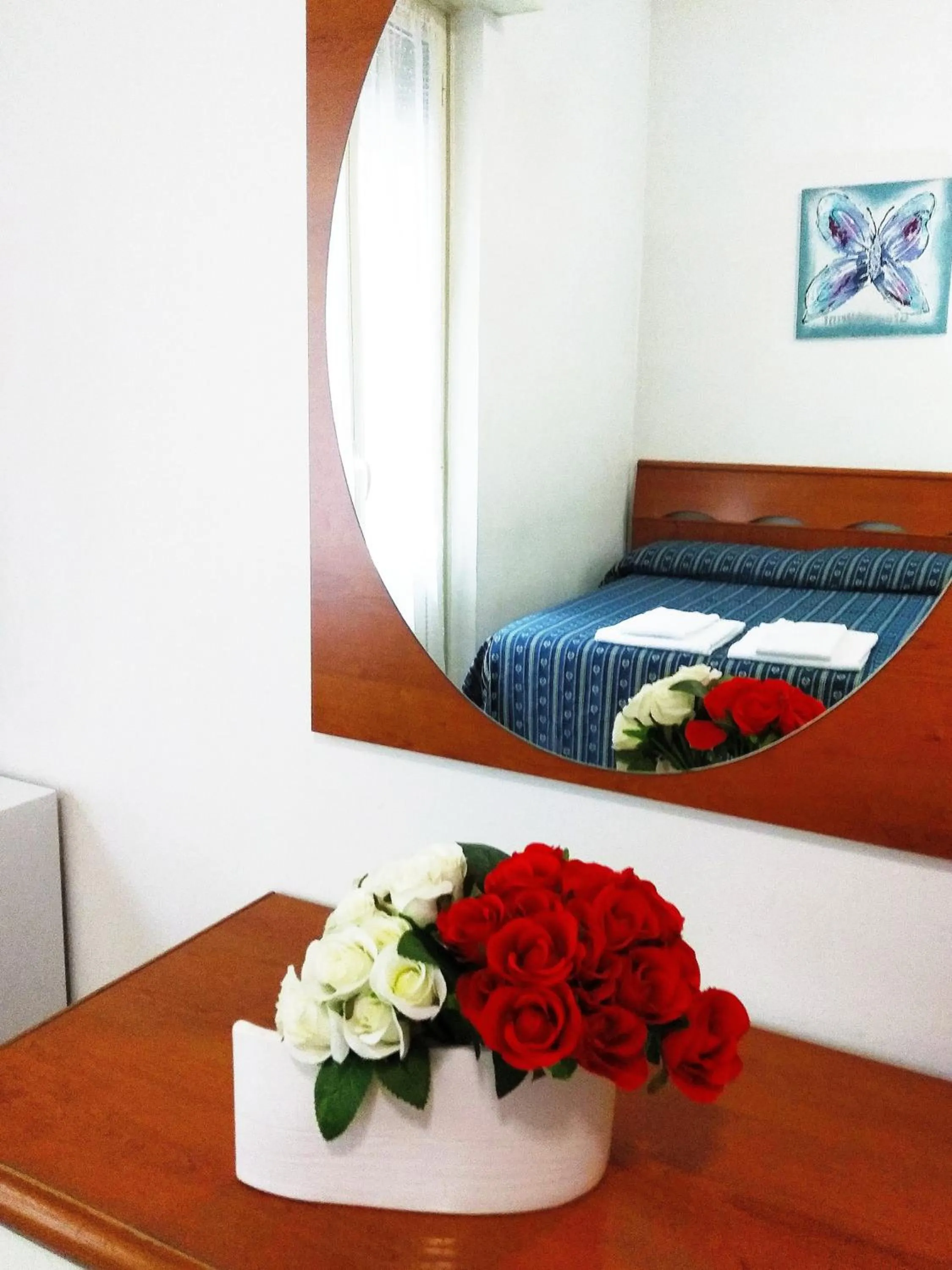 Decorative detail, Bed in Albergo Athena