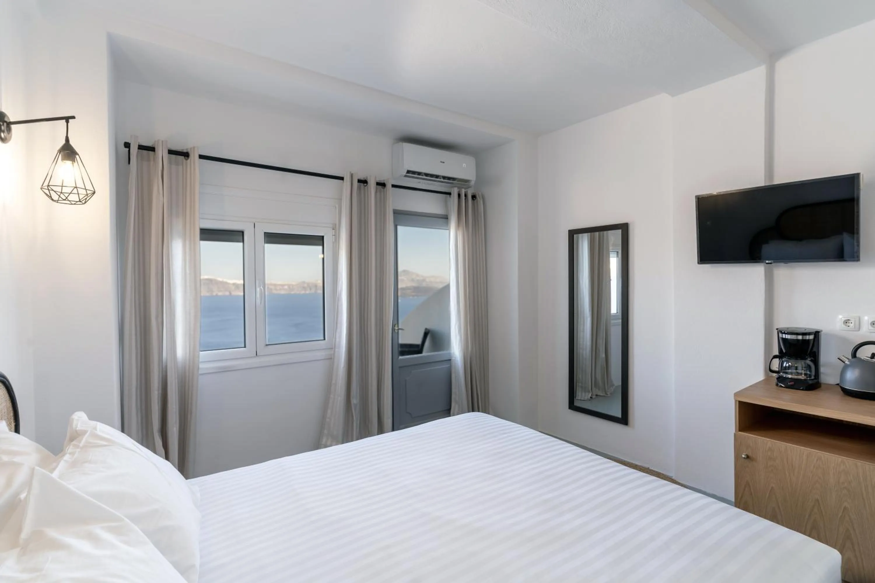 Photo of the whole room, Bed in Evanthia Best View Thirassia Island Hotel