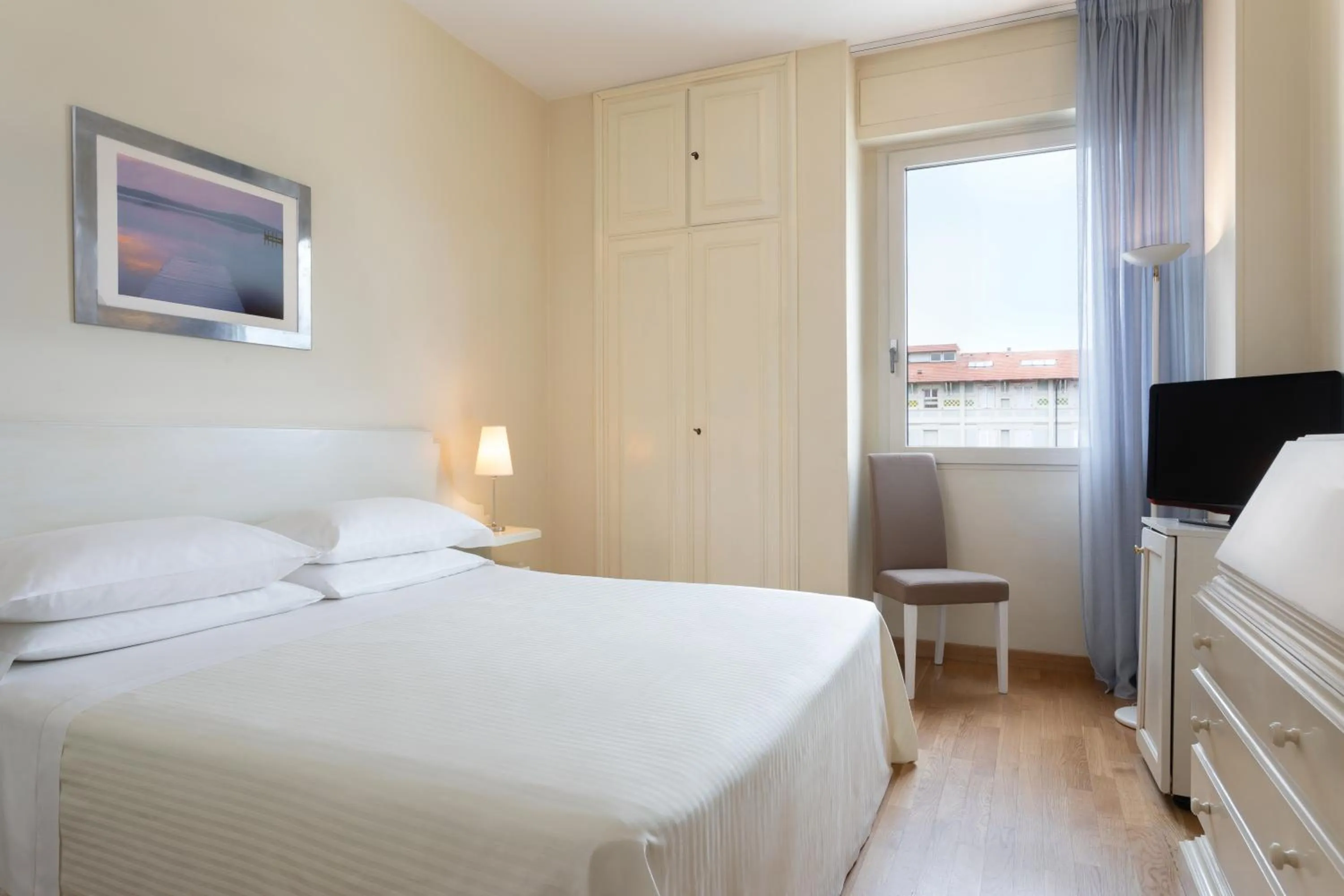 Bed in Hotel Sina Astor