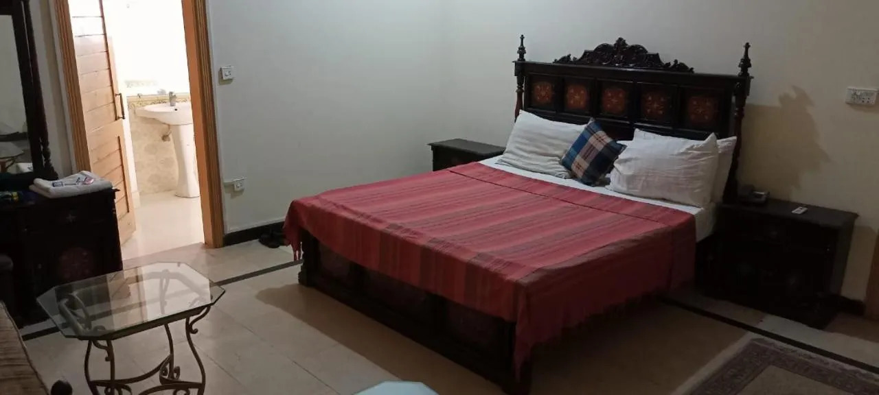 Photo of the whole room, Bed in Luxury Palace Peshawar