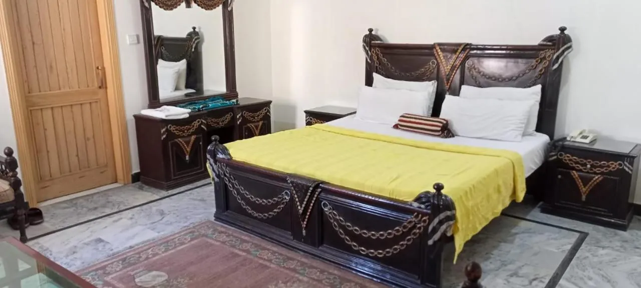 Photo of the whole room, Bed in Luxury Palace Peshawar