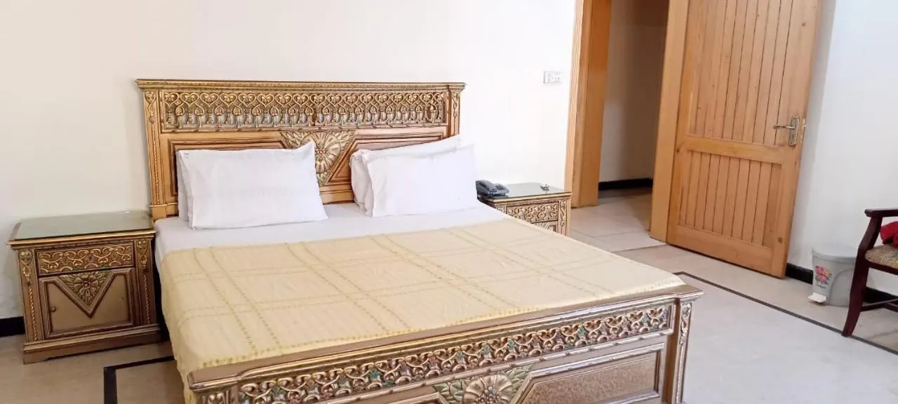 Photo of the whole room, Bed in Luxury Palace Peshawar