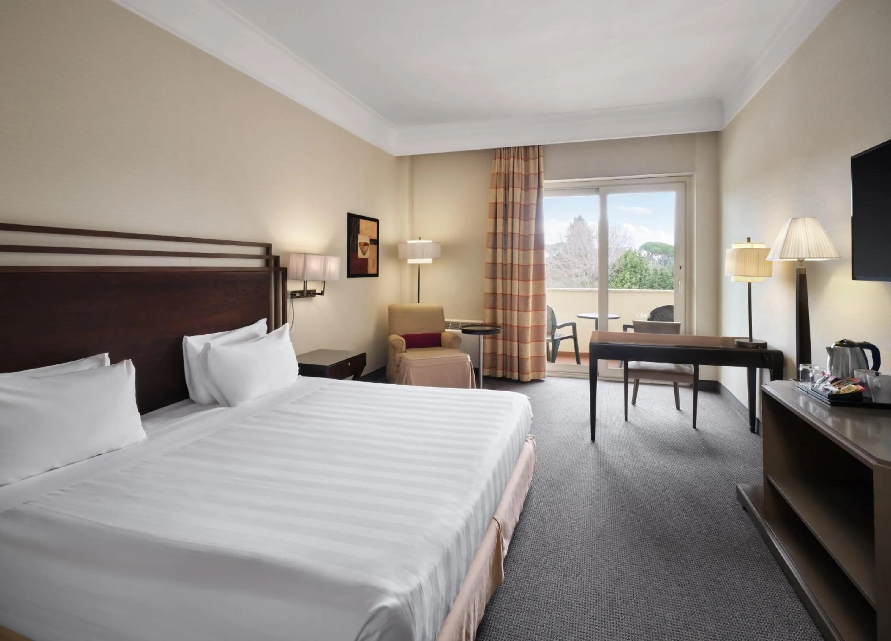 Photo of the whole room, Bed in Crowne Plaza Rome St. Peter's by IHG