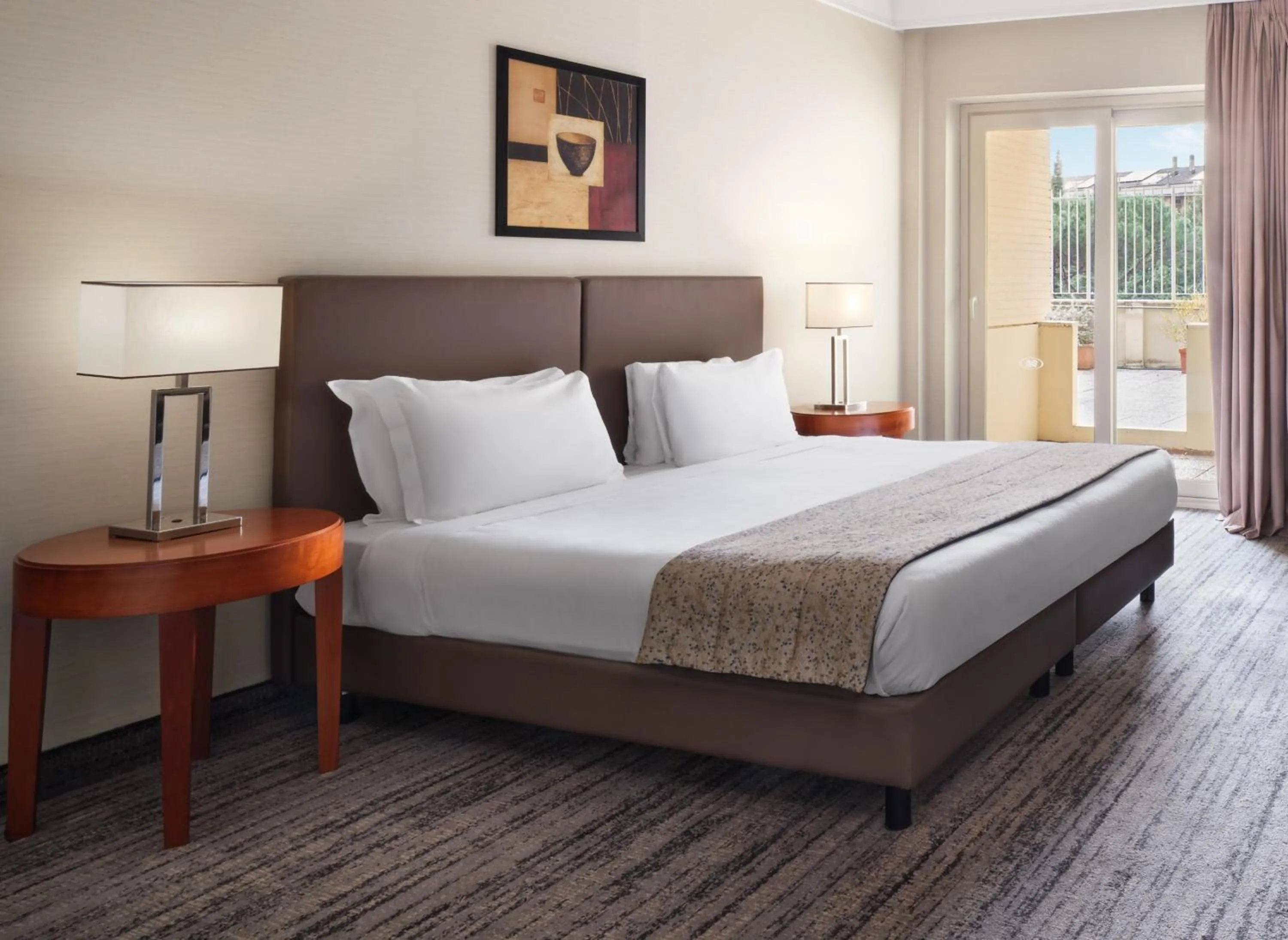 Photo of the whole room, Bed in Crowne Plaza Rome St. Peter's by IHG