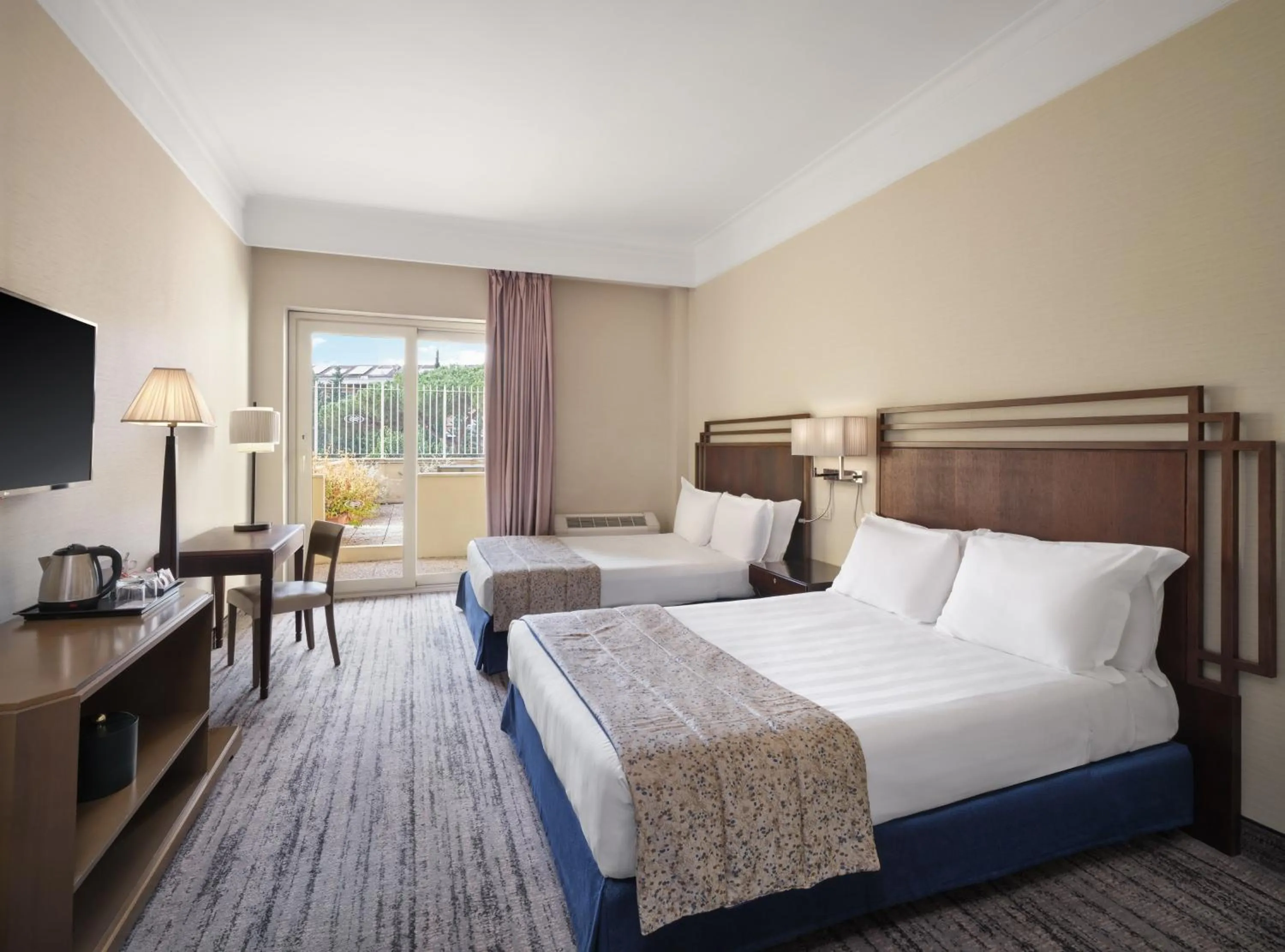 Photo of the whole room, Bed in Crowne Plaza Rome St. Peter's by IHG