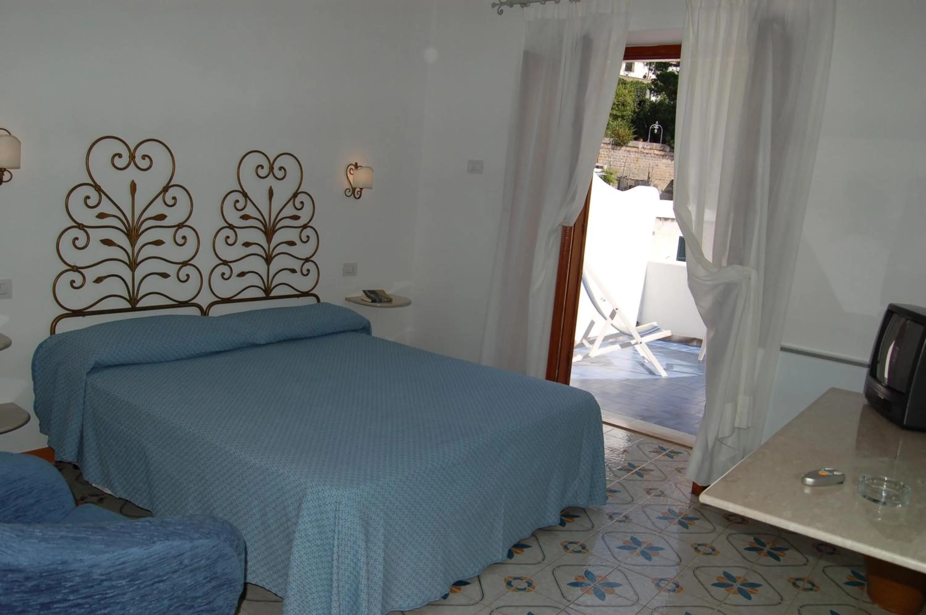 Bedroom in Hotel Vittoria