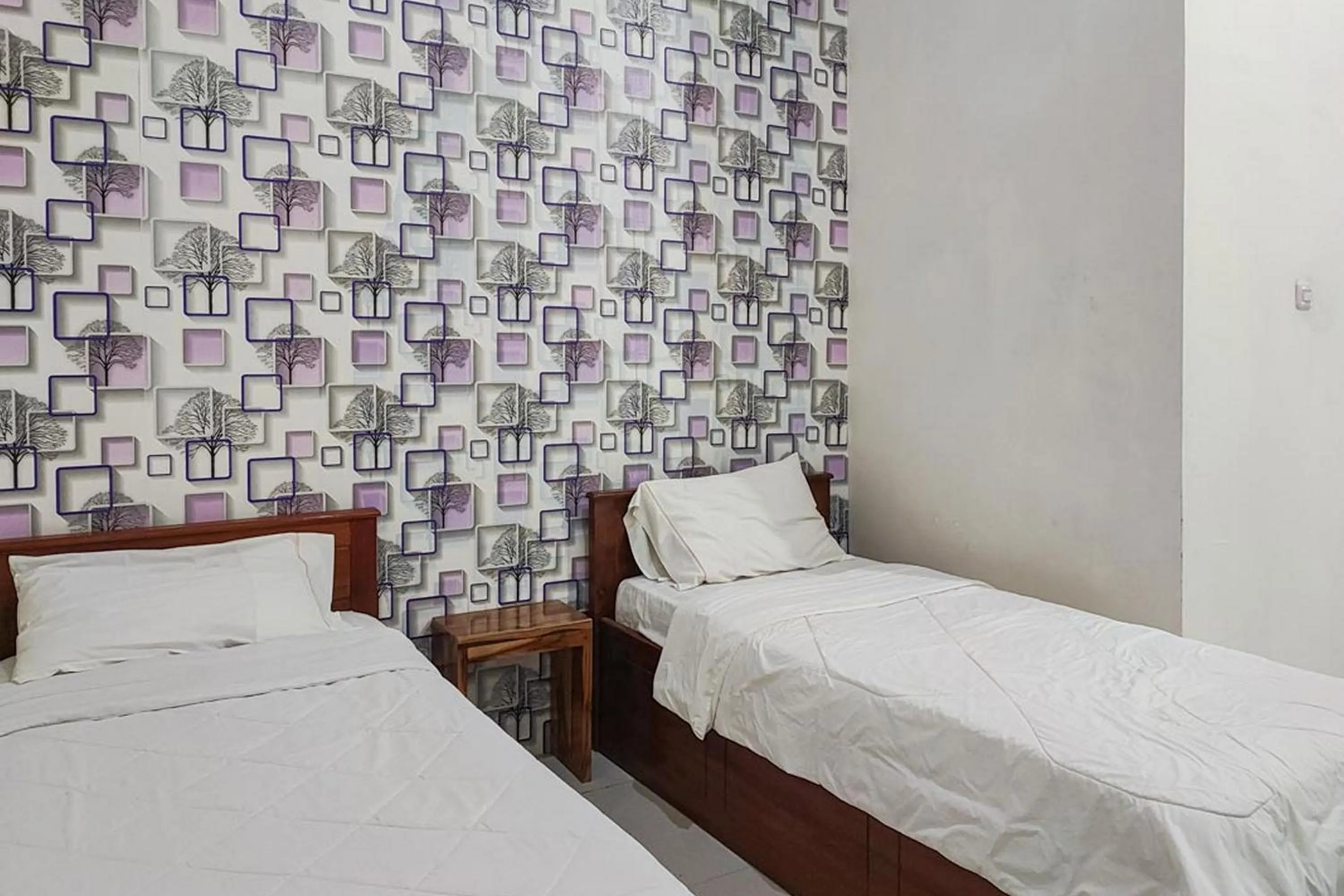 Bedroom, Bed in RedDoorz at Tanakatto Homestay Waikabubak