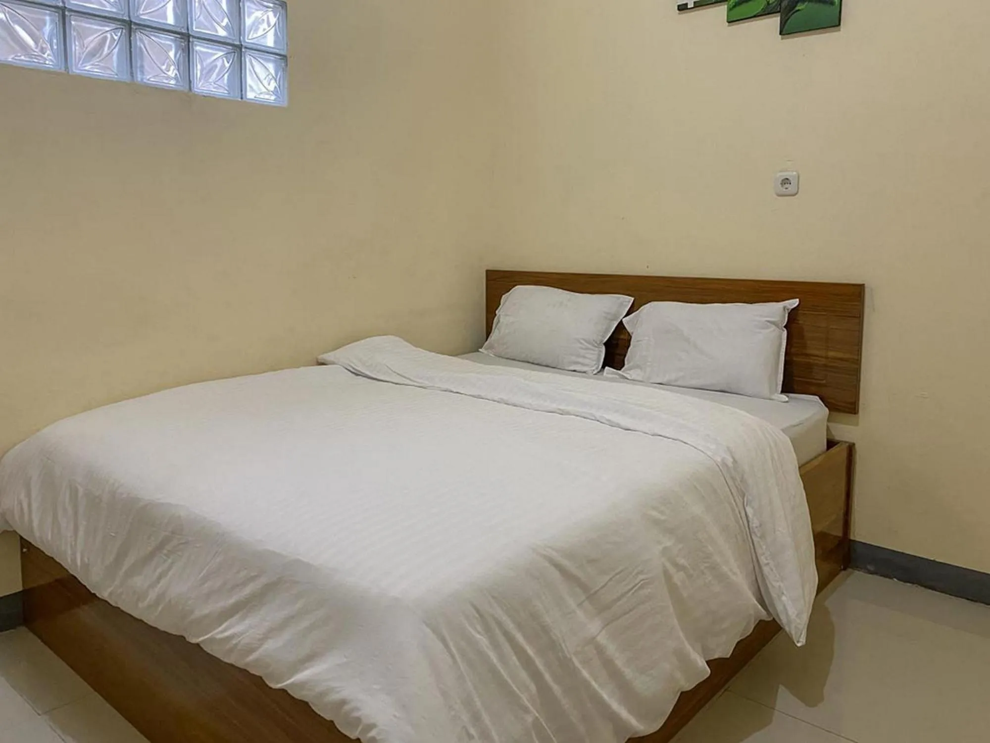 Bed in RedDoorz @ Merauke City Center