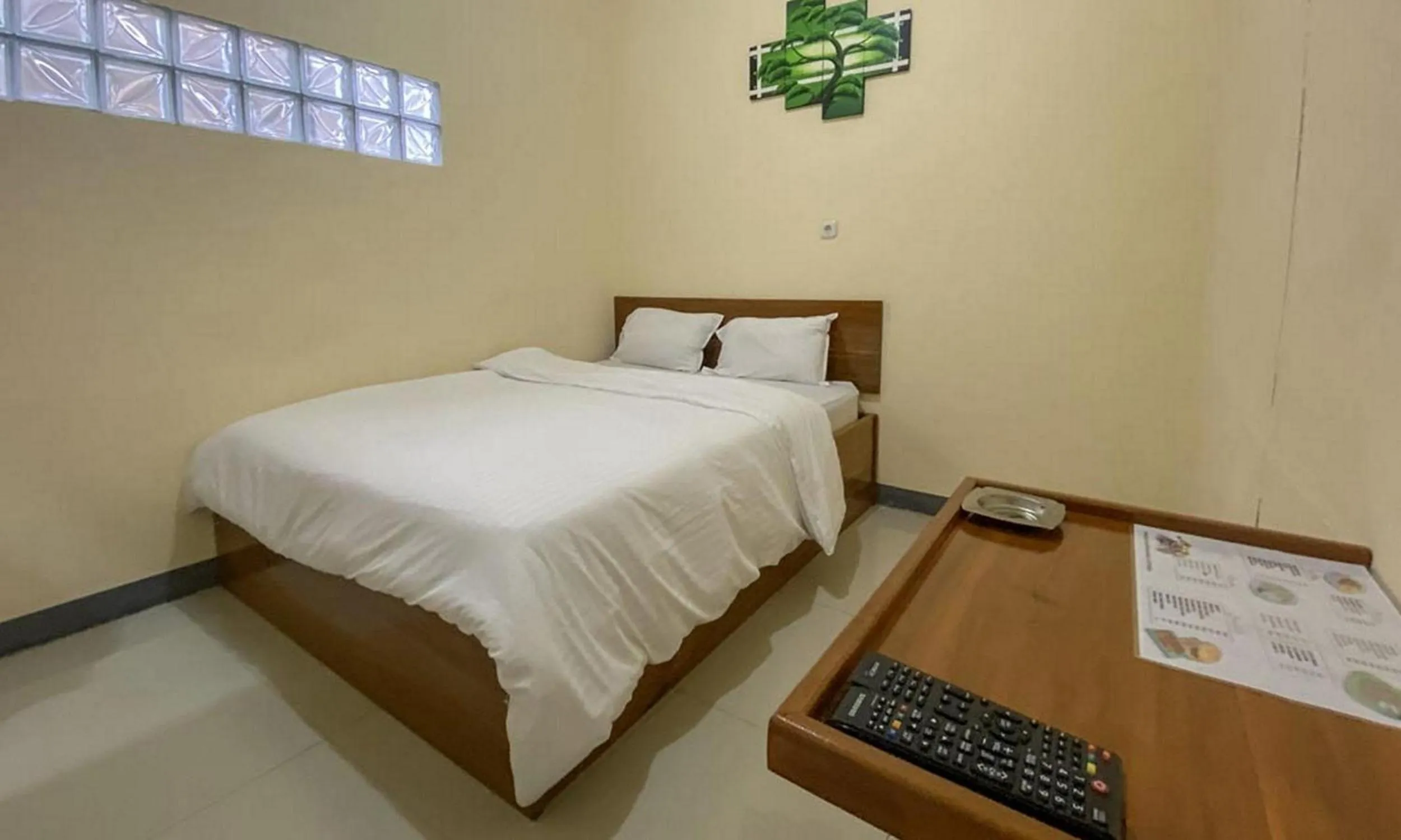 Bed in RedDoorz @ Merauke City Center