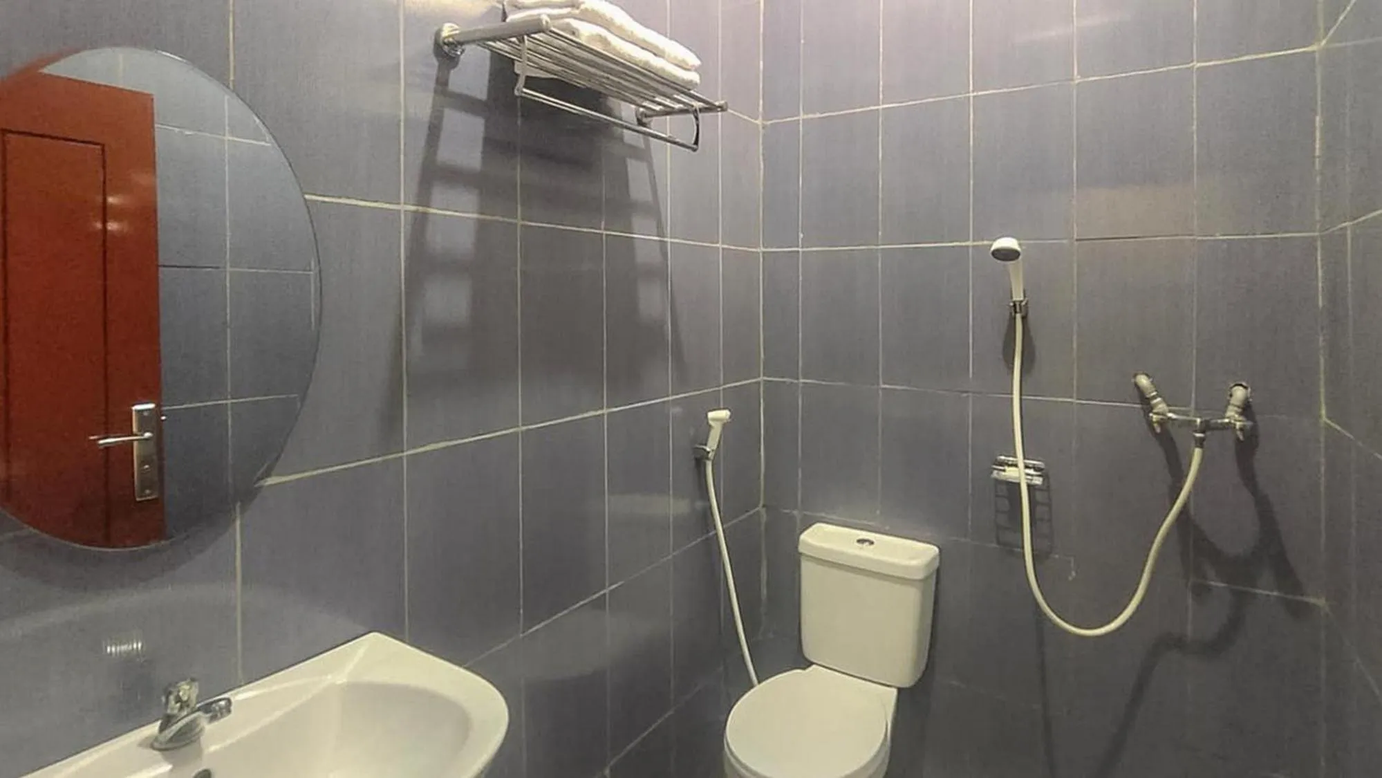 Bathroom in RedDoorz @ Merauke City Center