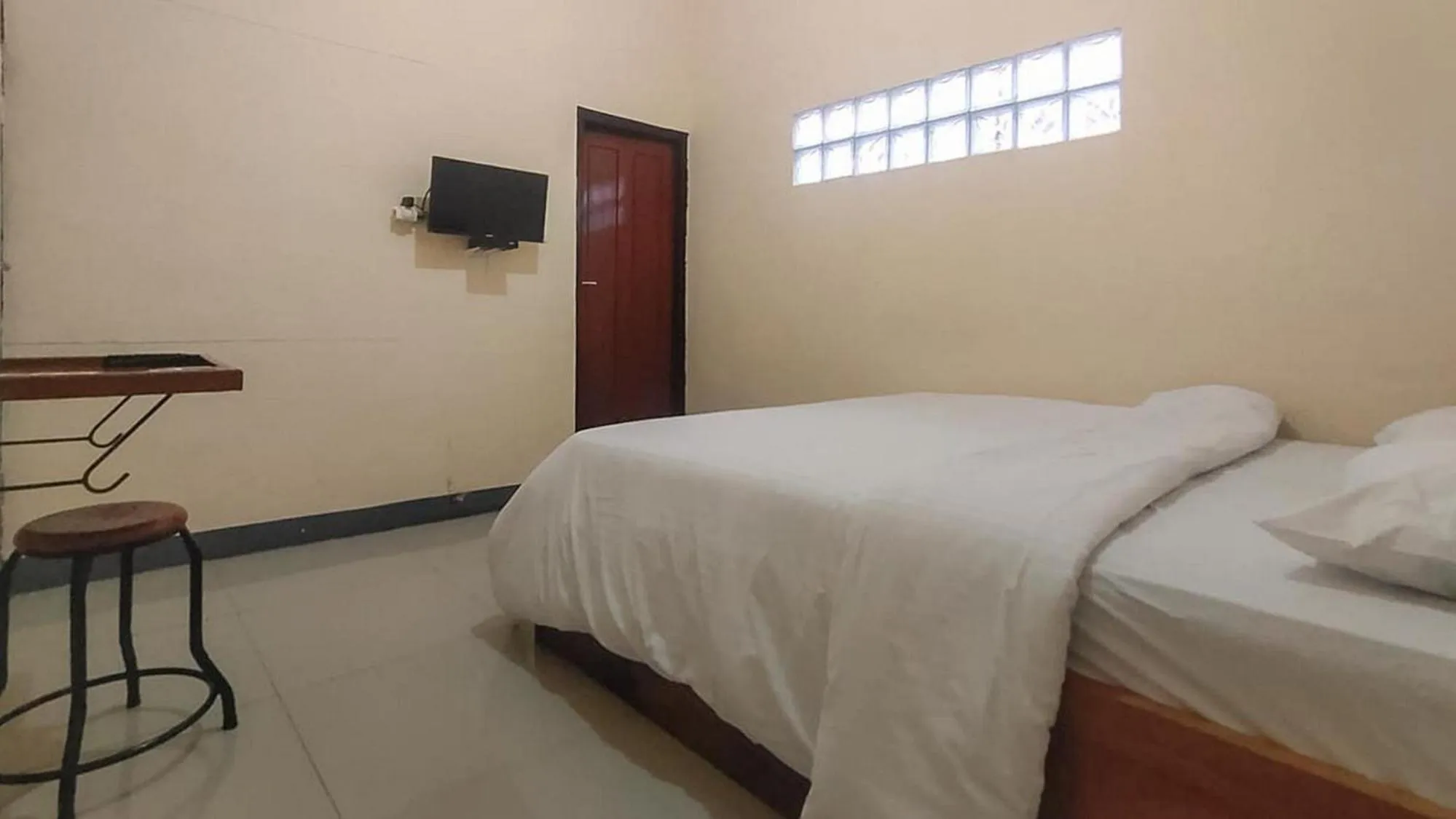 Bed in RedDoorz @ Merauke City Center