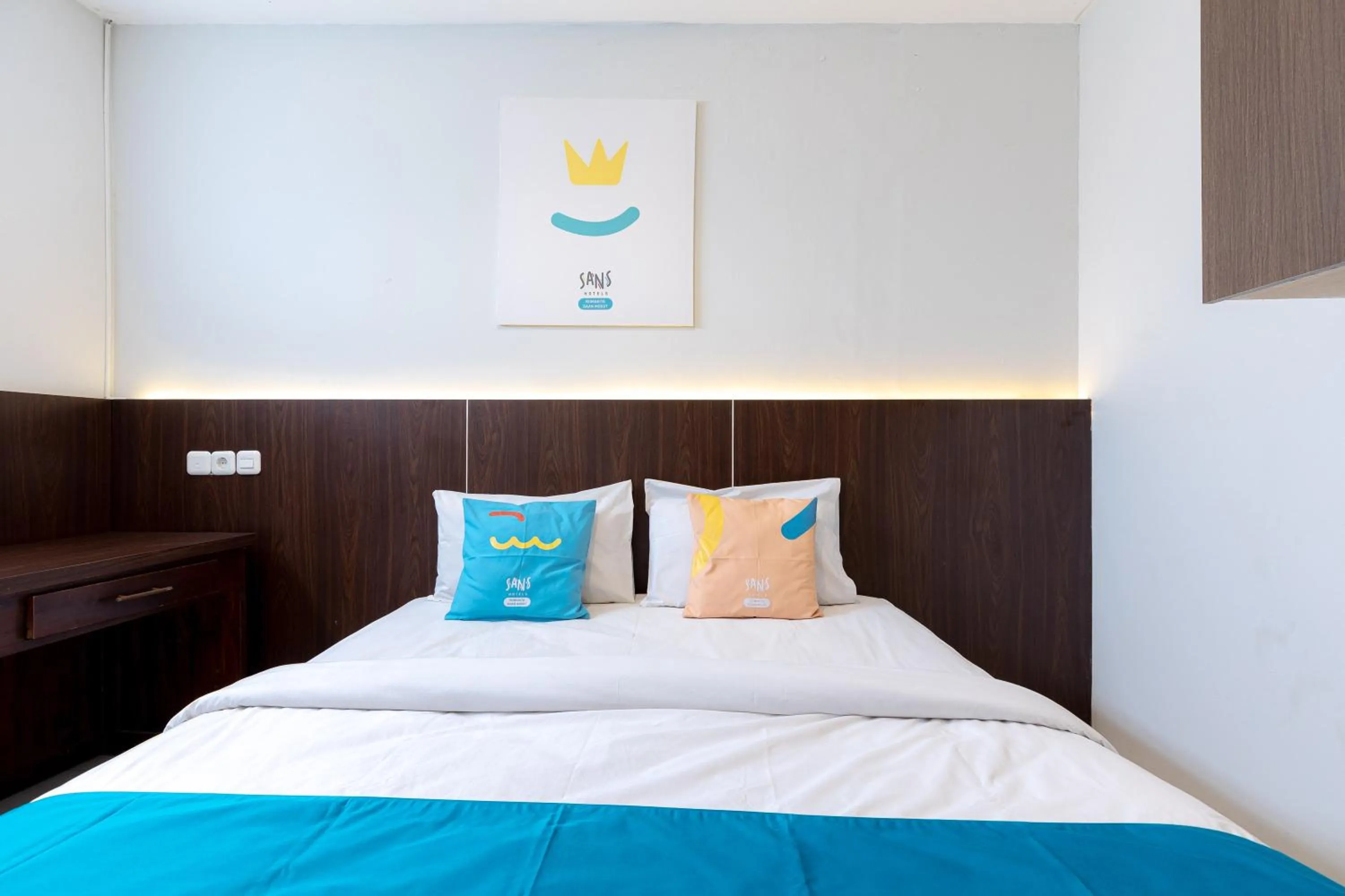 Bedroom, Bed in Sans Hotel Rumah Kita Daan Mogot by RedDoorz