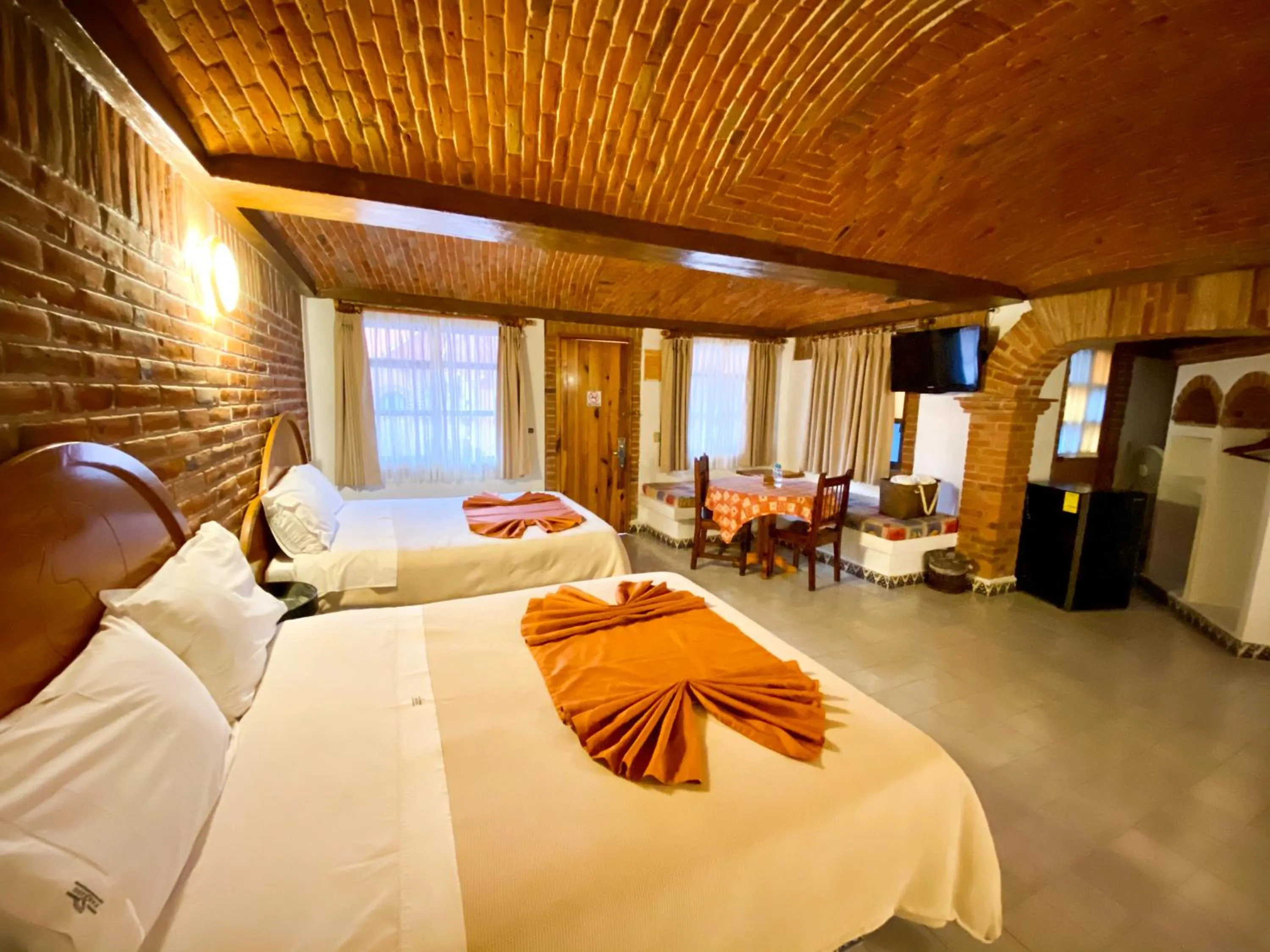 Bed in Suites Paraiso Tequis