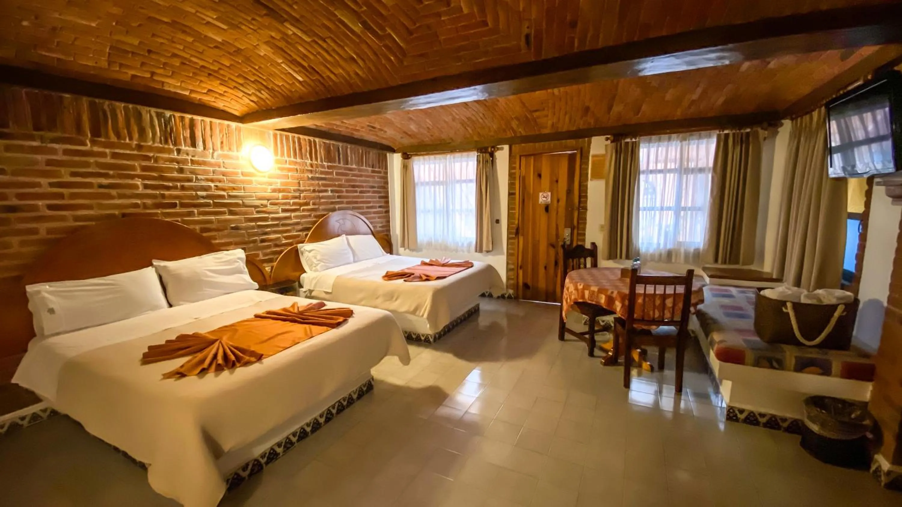 Bed in Suites Paraiso Tequis