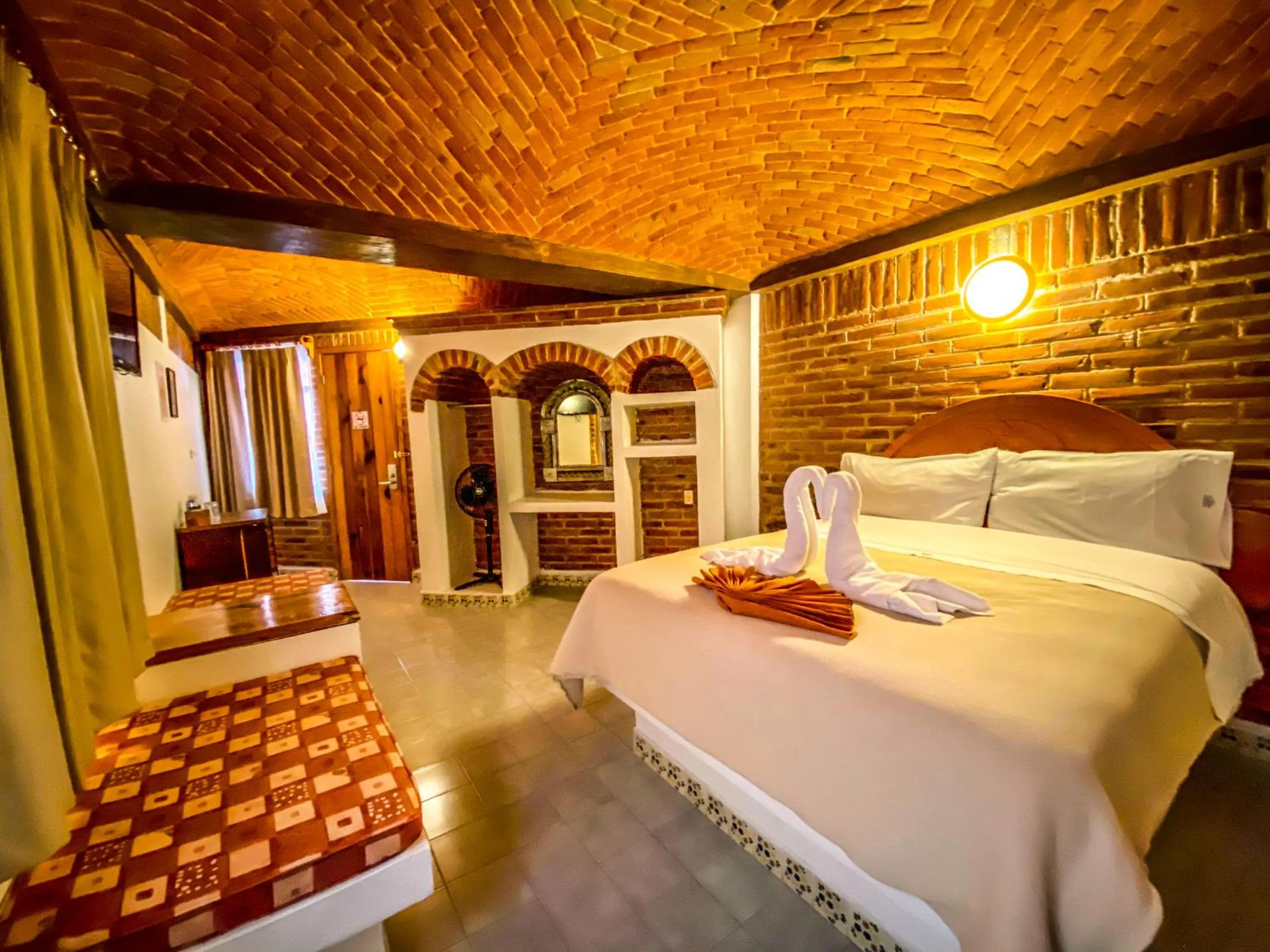 Bed in Suites Paraiso Tequis