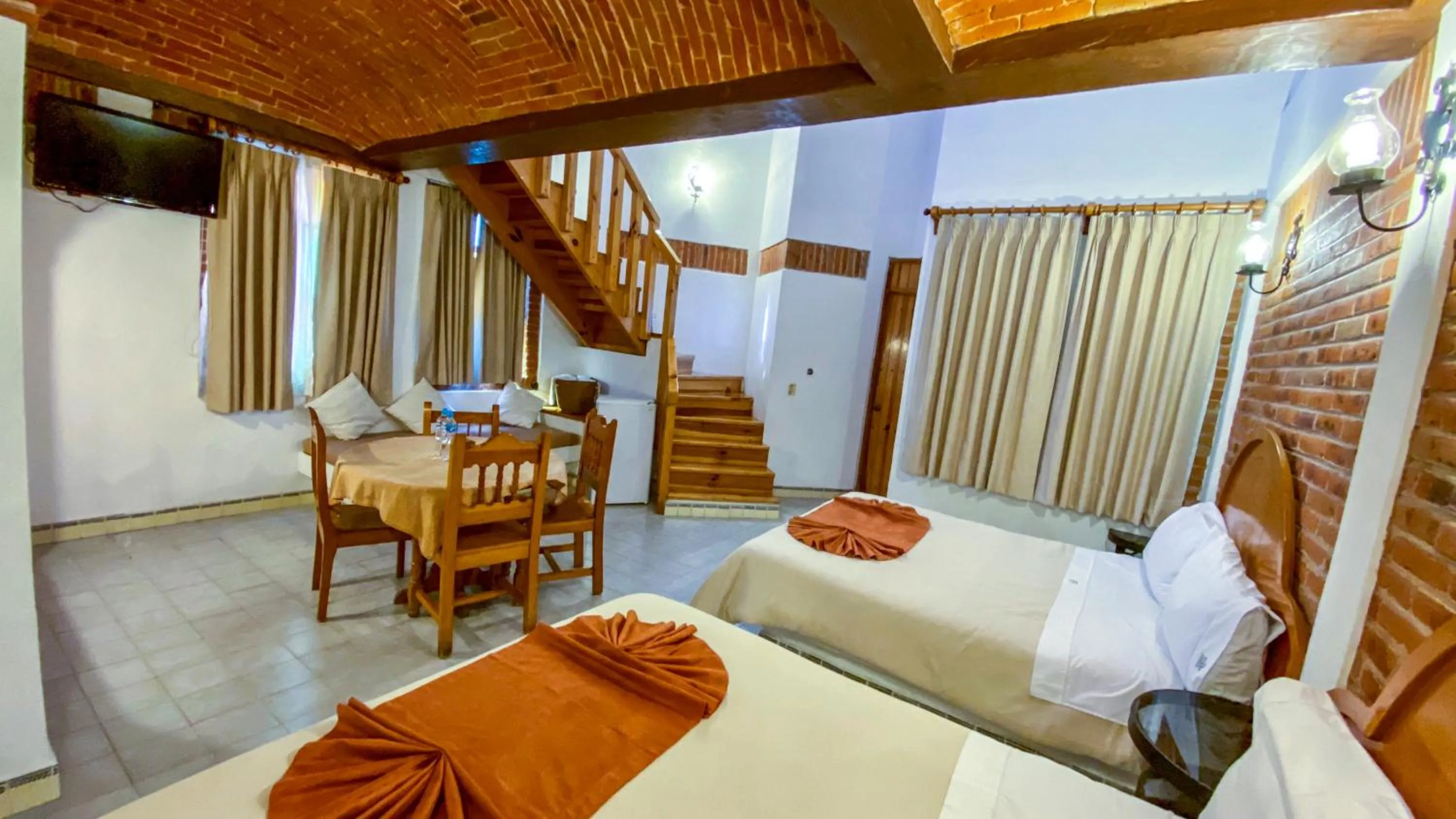 Bed in Suites Paraiso Tequis