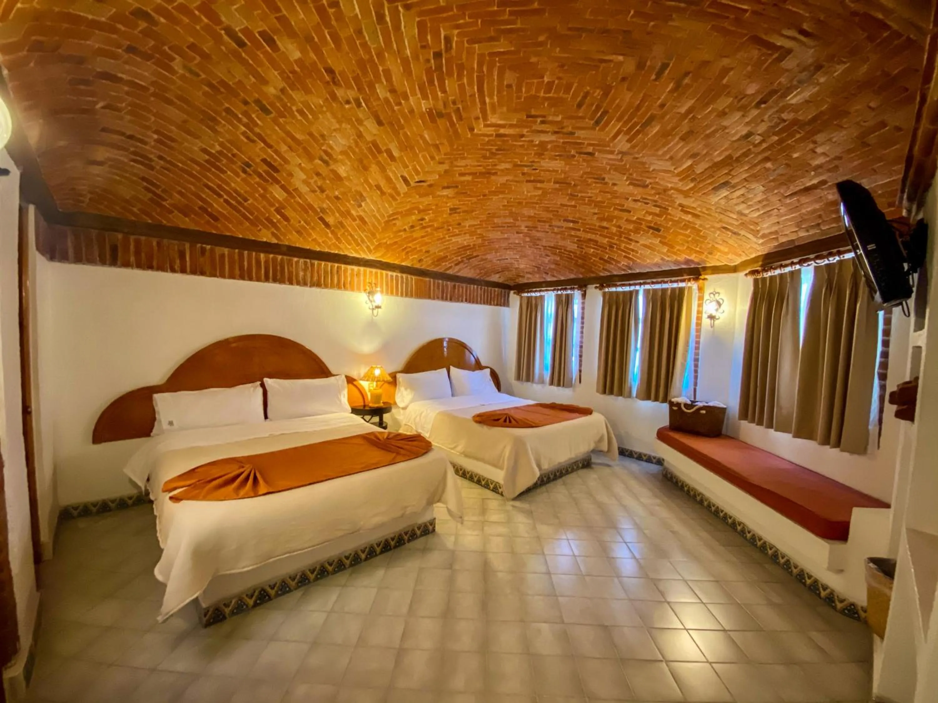 Bed in Suites Paraiso Tequis