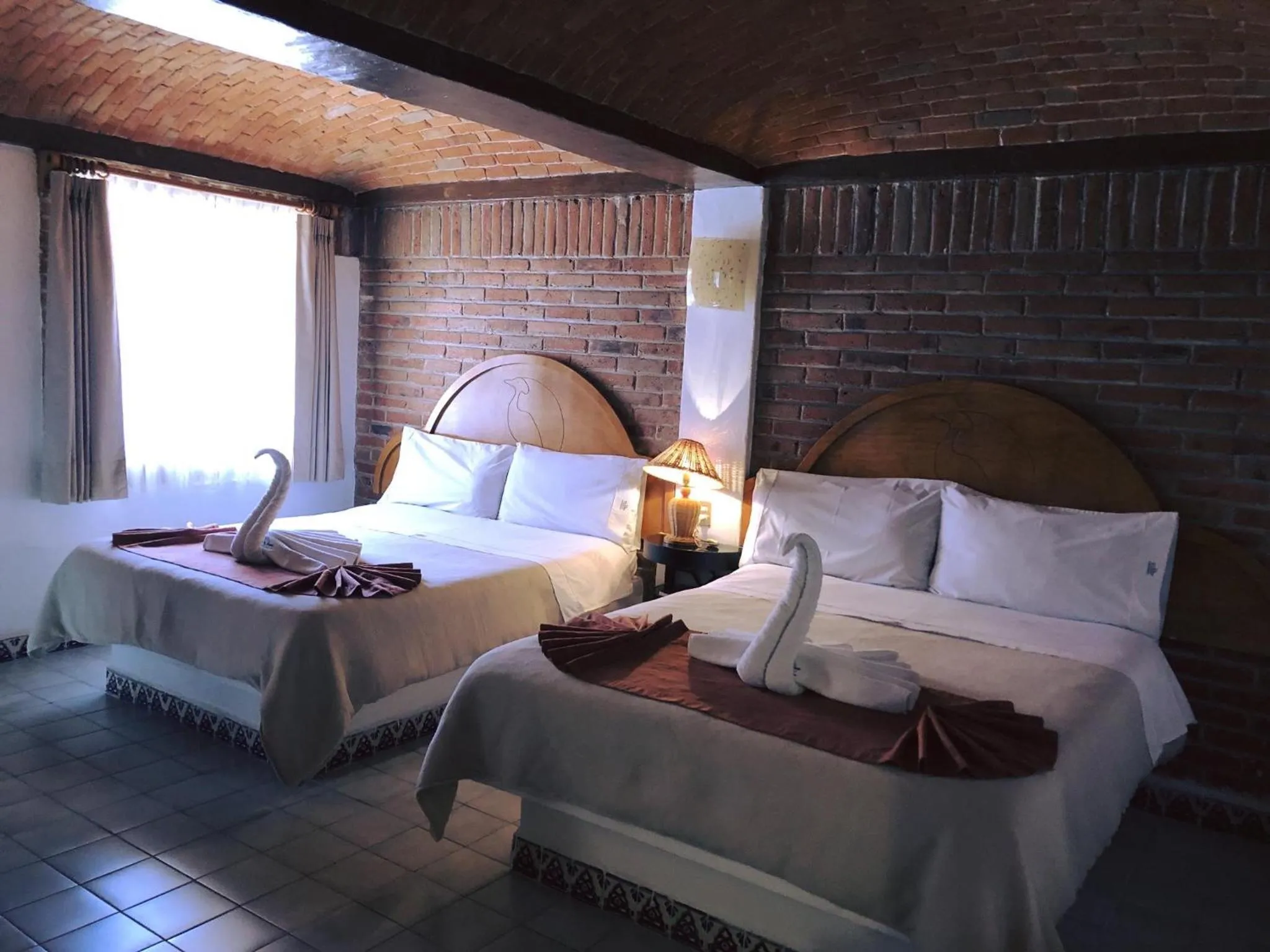 Bed in Suites Paraiso Tequis