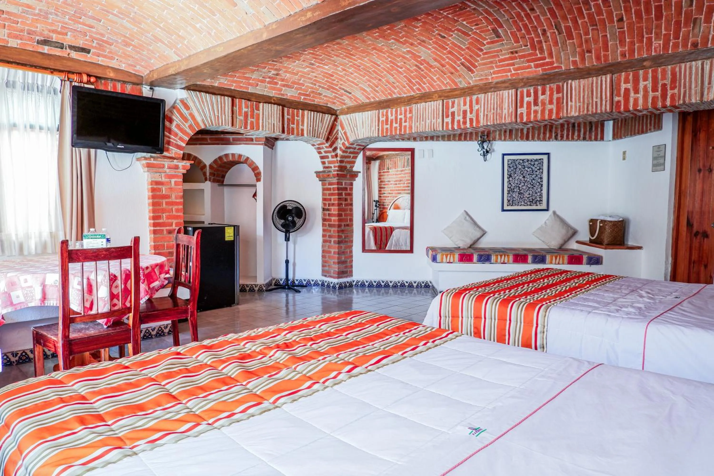 Bed in Suites Paraiso Tequis